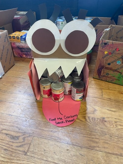 Beansprouts made an adorable collection monster and brought about 15 large boxes of food for our Thanksgiving giveaway. 