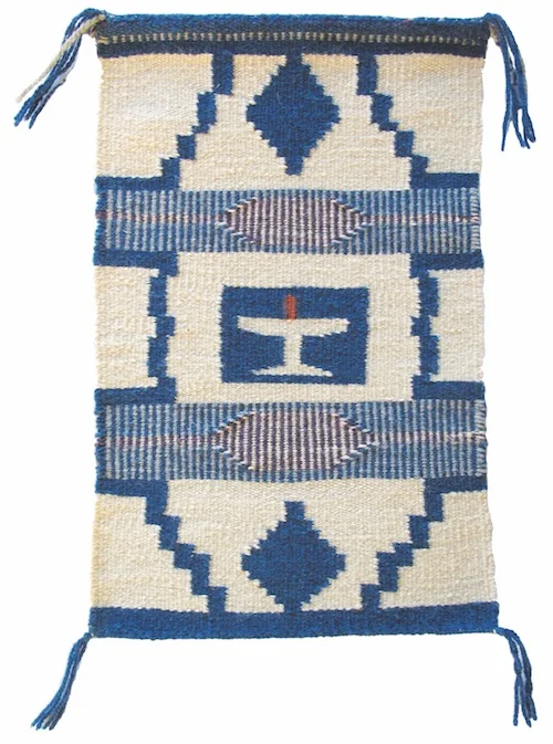 WOVEN BY MONA KIRK, an early member of UUFCO. Each Sunday, no matter where we were meeting, until the time we moved to our New Home, Mona's weaving hung on the front of the podium. It hangs now in the Founders' Fireside Room.