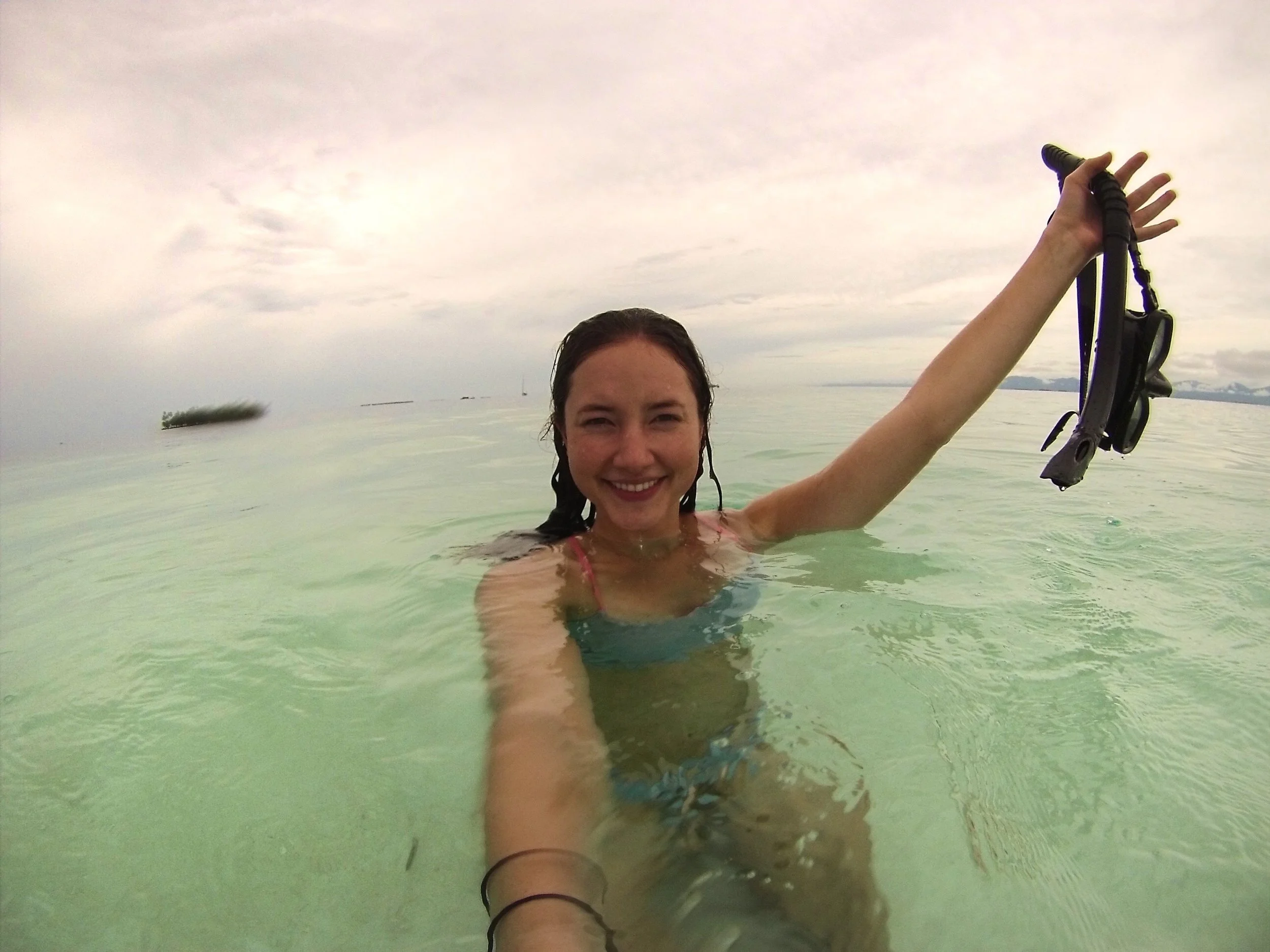 On a sandbar in the middle of the ocean as part of our tour of the different islands.