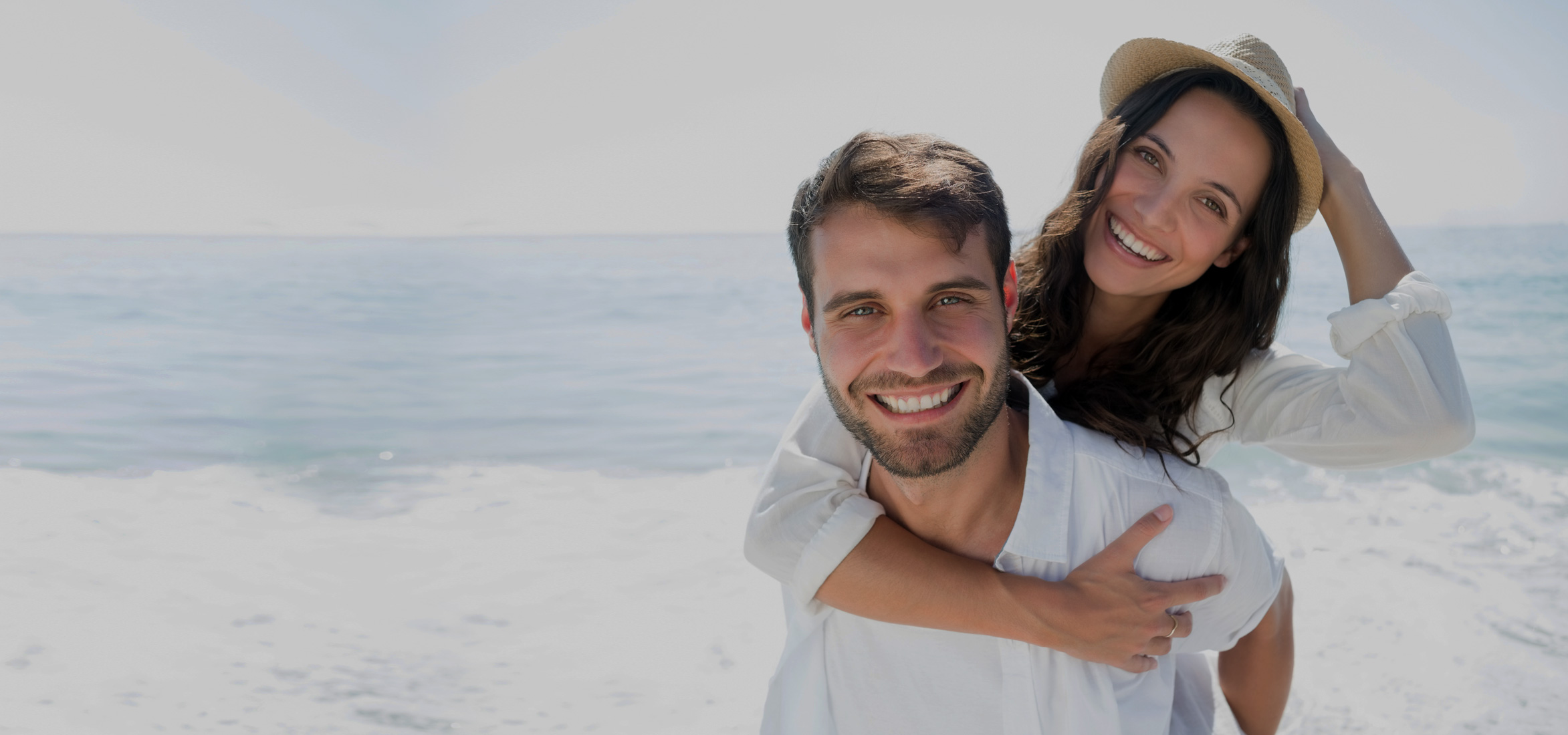stock-photo-happy-couple-smiling-at-the-beach-277907699.jpg