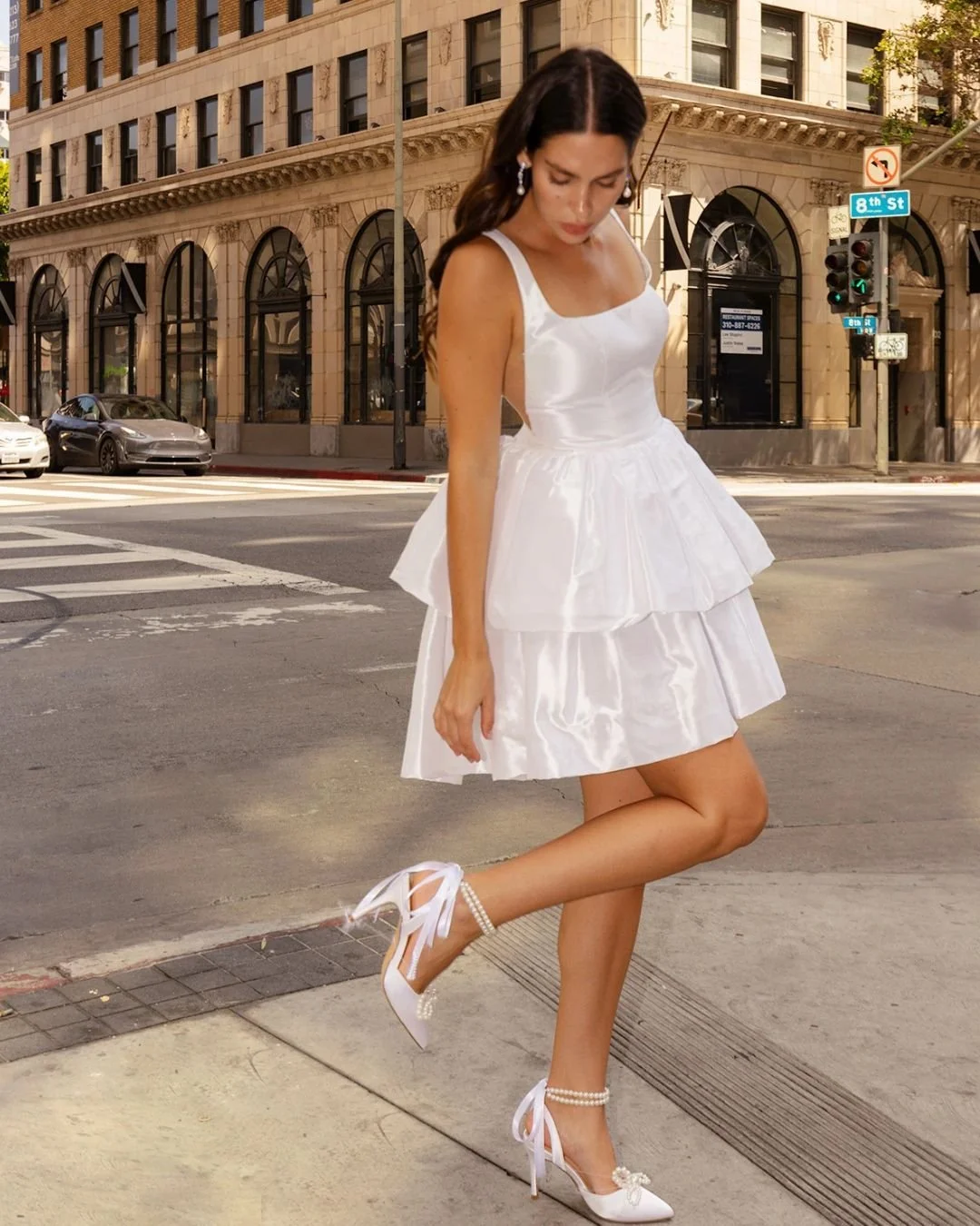 @allwhowander London Mini ON SALE now!
This modern mini redefines bridal fashion with its flirty, luxe design and versatile style, for the fun-loving bride. Sleek shoulder straps lead to a chic square neckline, complementing a fitted bodice with on-t