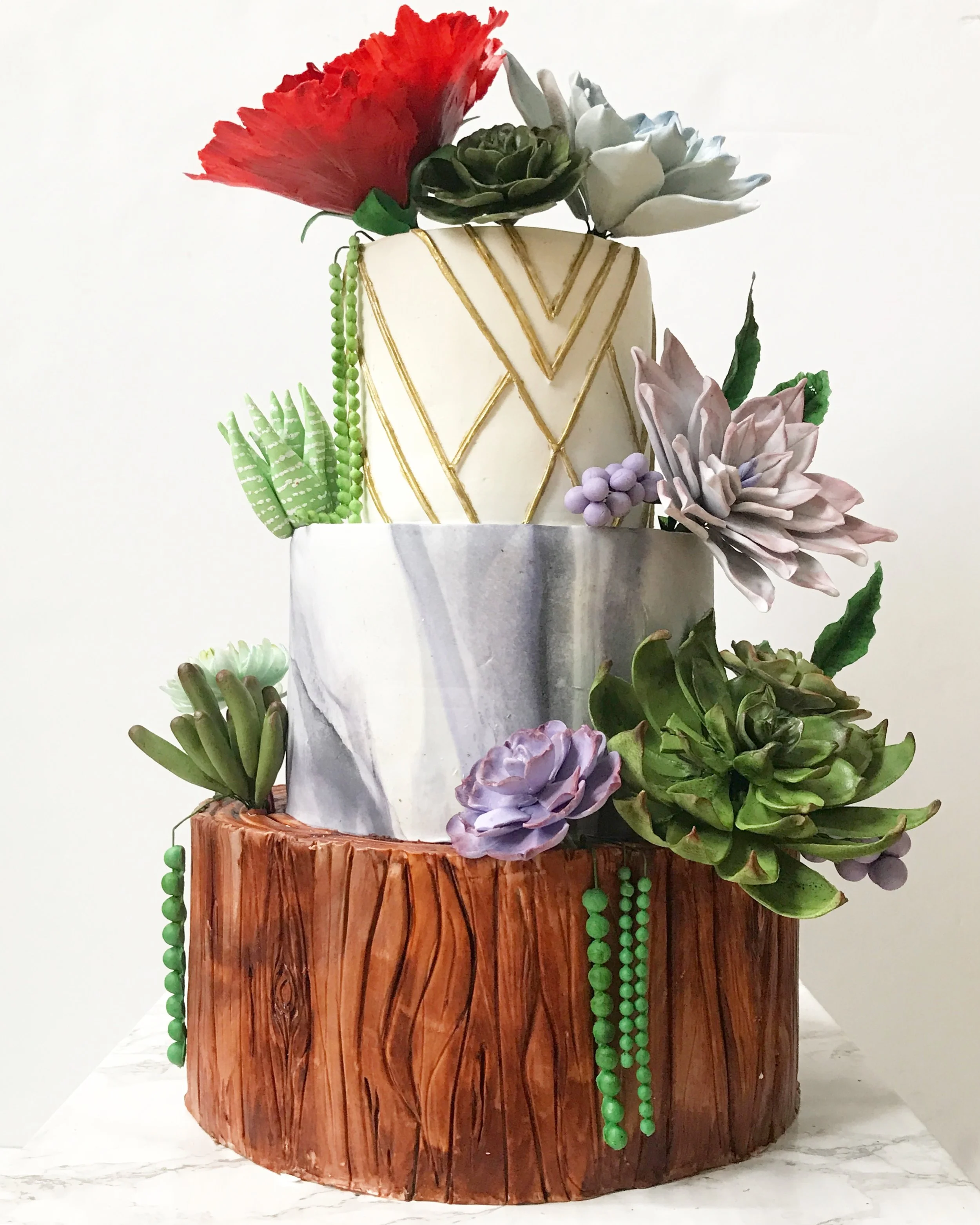 Garden style cake with sugar paste succulent florals