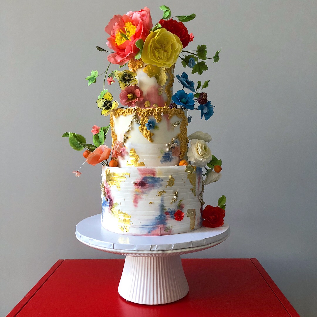 Fondant covered cake with wafer paper florals