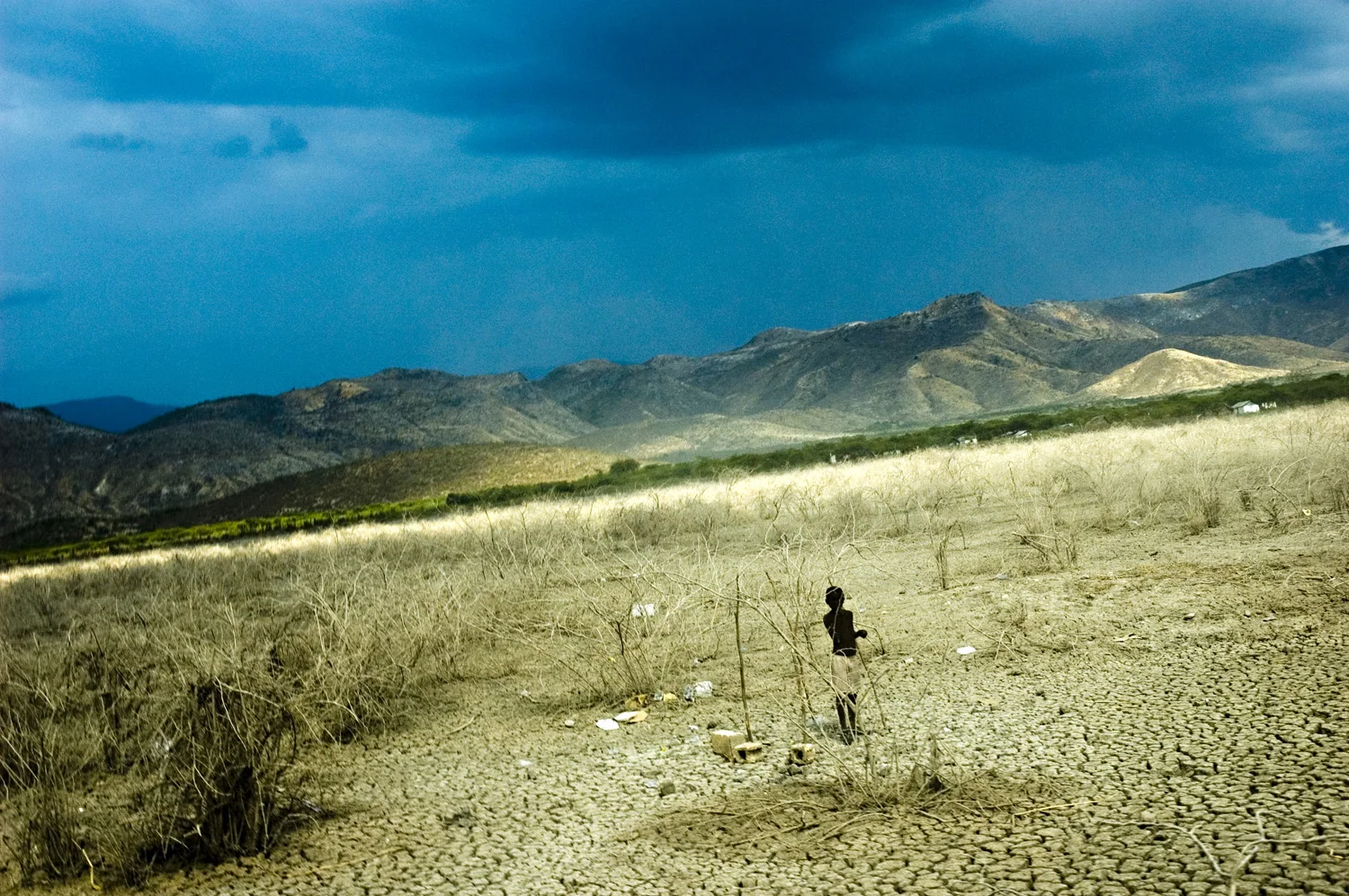 The deforested mountains had no topsoil to absorb or slow the rushing water that beseiged Gonaives during Hurricane Jeanne in 2004. When the rain ceased, more than 3,000 people had been killed, many washed out to sea. Thousands of people were made homeless.