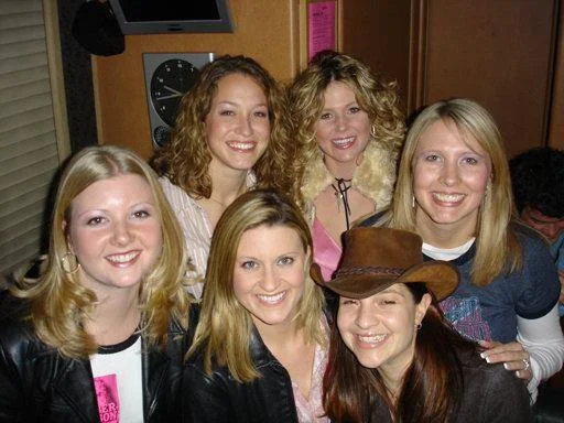 A group shot from our 1st neighborhood group of girls! This was backstage at a George Strait, Dierks Bentley and Amber Dotson concert. Amber, pictured in the back right, was also our neighbor and she opened for George Strait's tour that year. (Picture 2004).