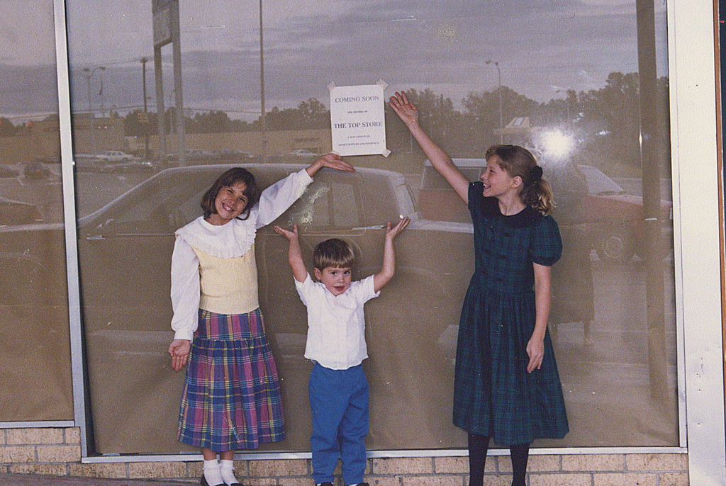My sister, my brother and I standing in front of The T.O.P. store before it opened a few doors down from Service Merchandise