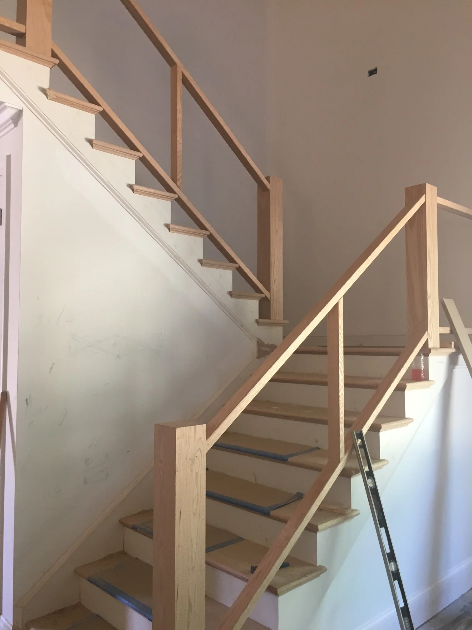 Staircase being built; it will be stained in a similar gray wash like the trusses and to match the floors upstairs.