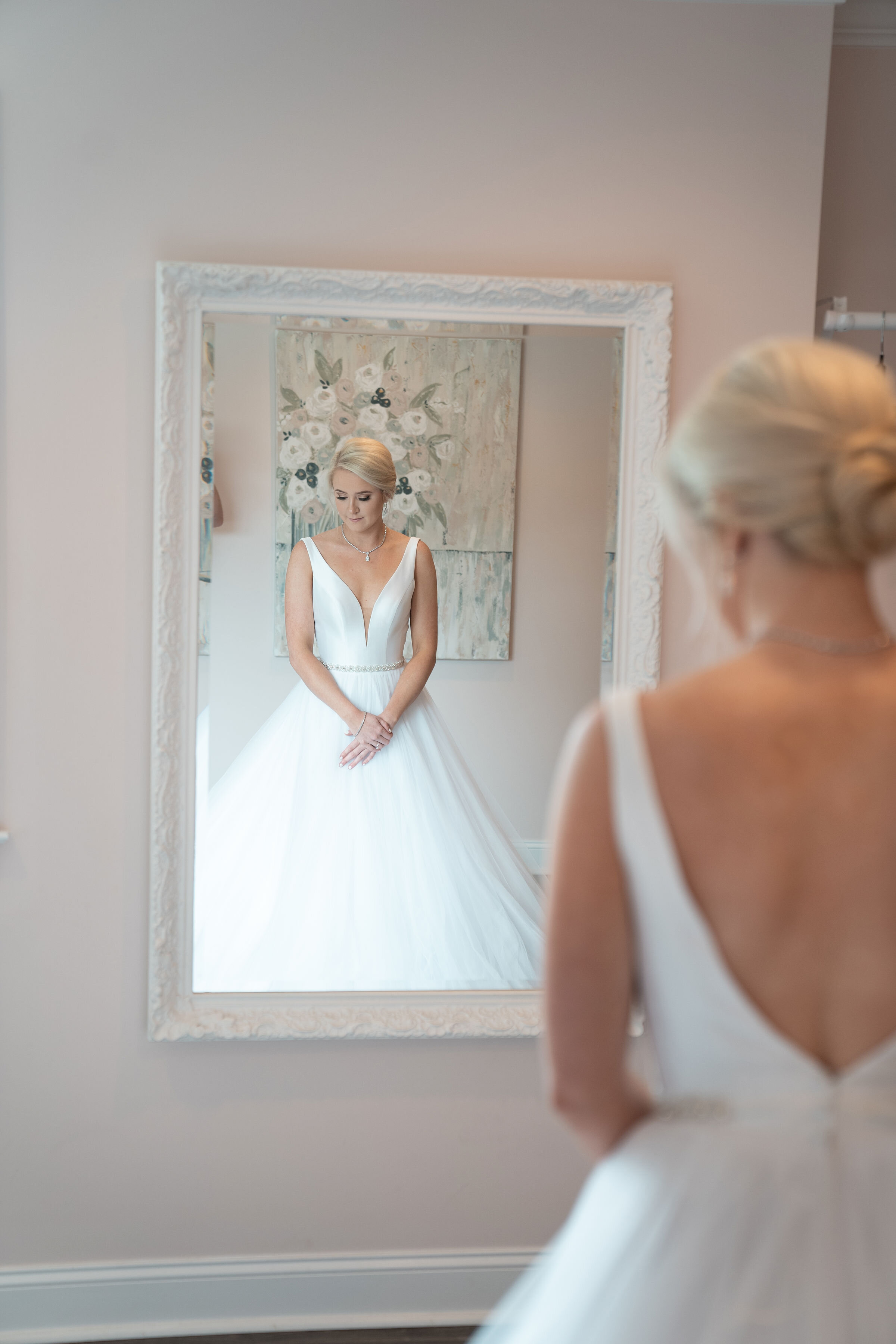 bride infront of antique white mirror .jpg