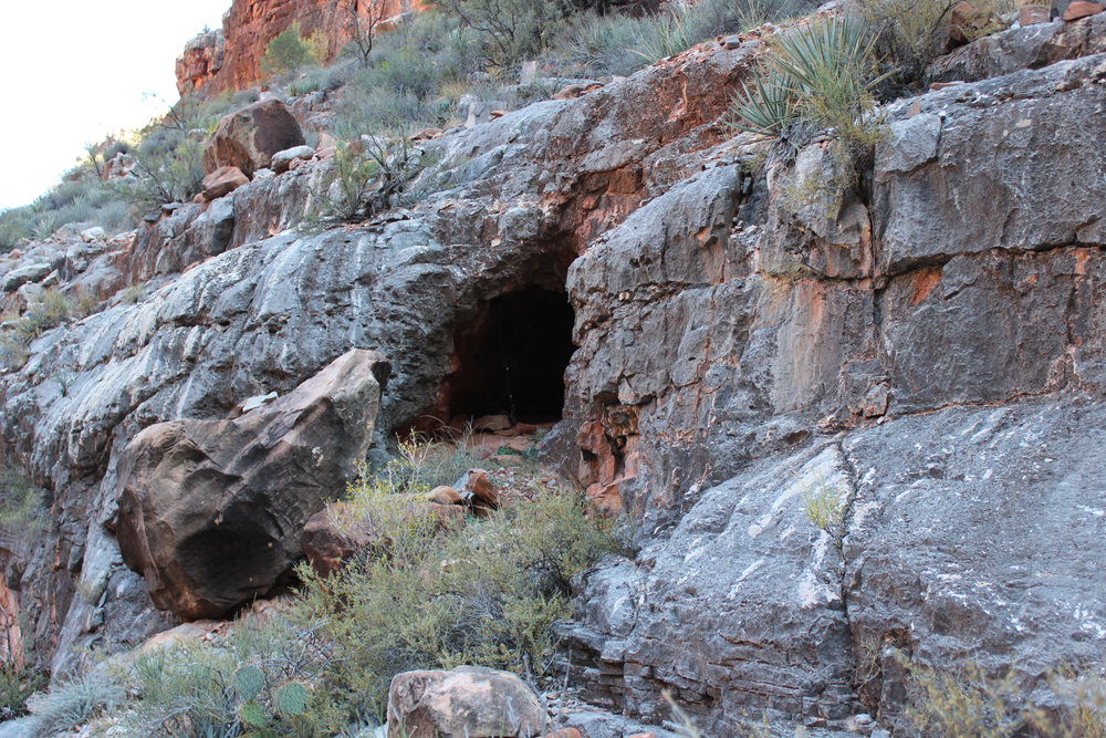 A cave at the top of the redwall.