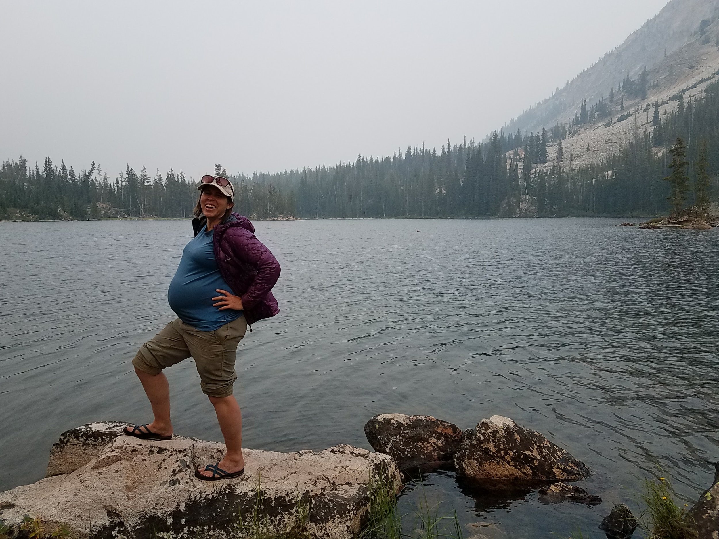 Tory had some fun showing off her belly at the lake.