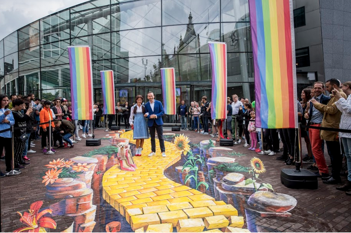 Museum director Axel Rüger walks the Yellow Brick Road with fictional character Dorothy. via vangoghmuseum