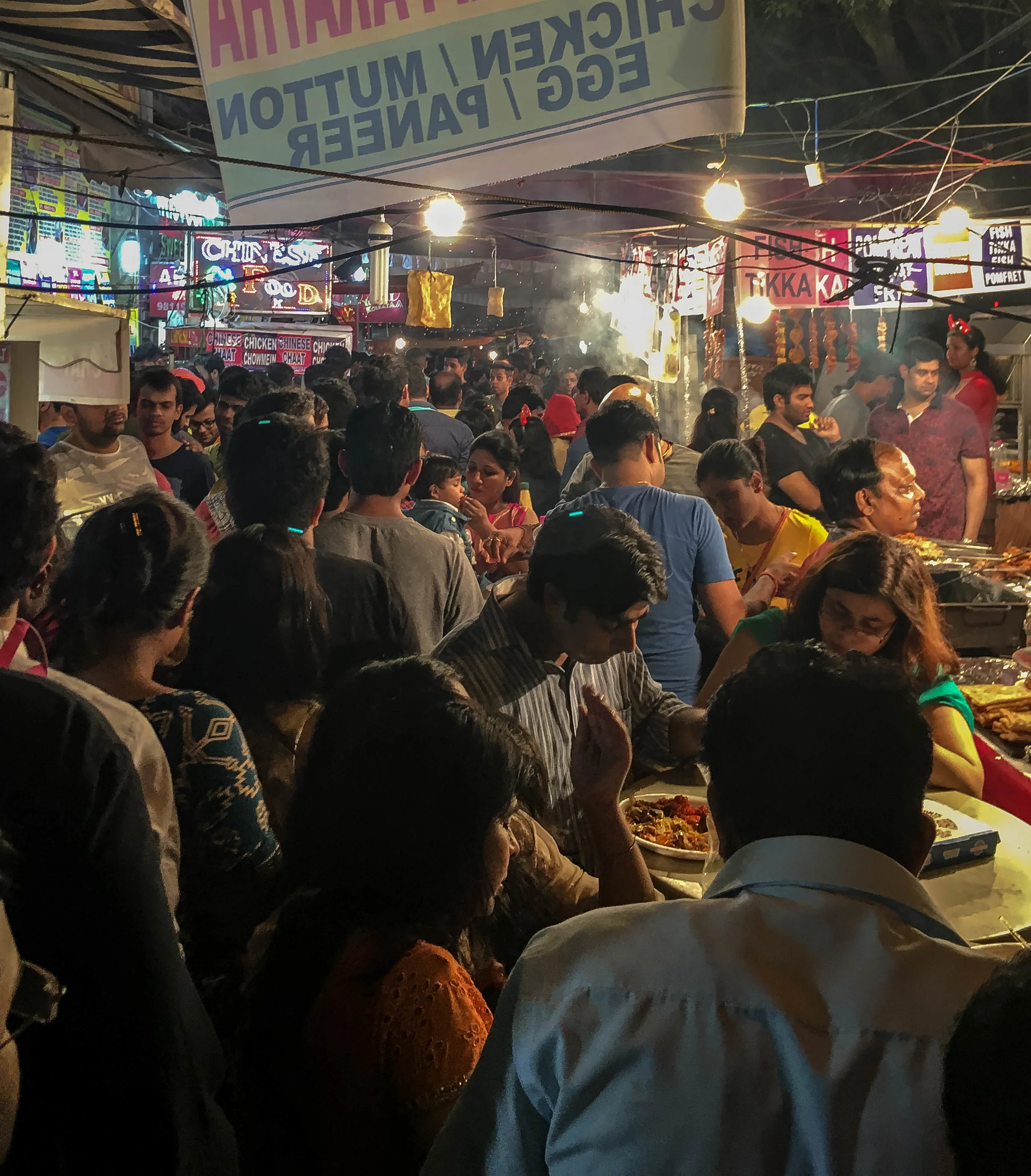 And the last leg of the CR Park pilgrimage is a pilgrimage unto itself. Even tiny babies are allowed to brave spicy street food today. Brownie points if you can spot the guilty mom!