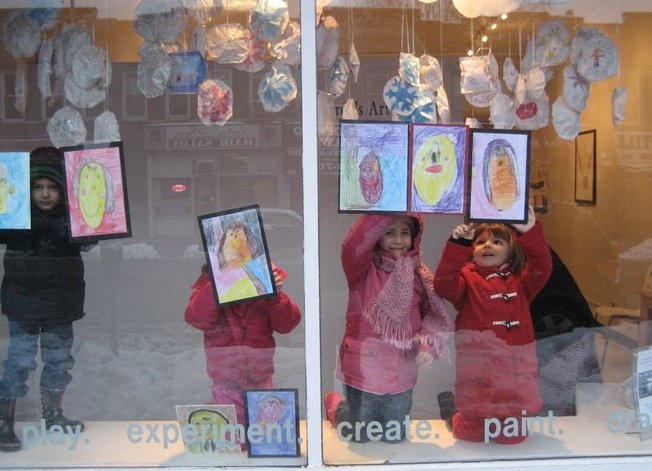 Art students dressing our window with their creations