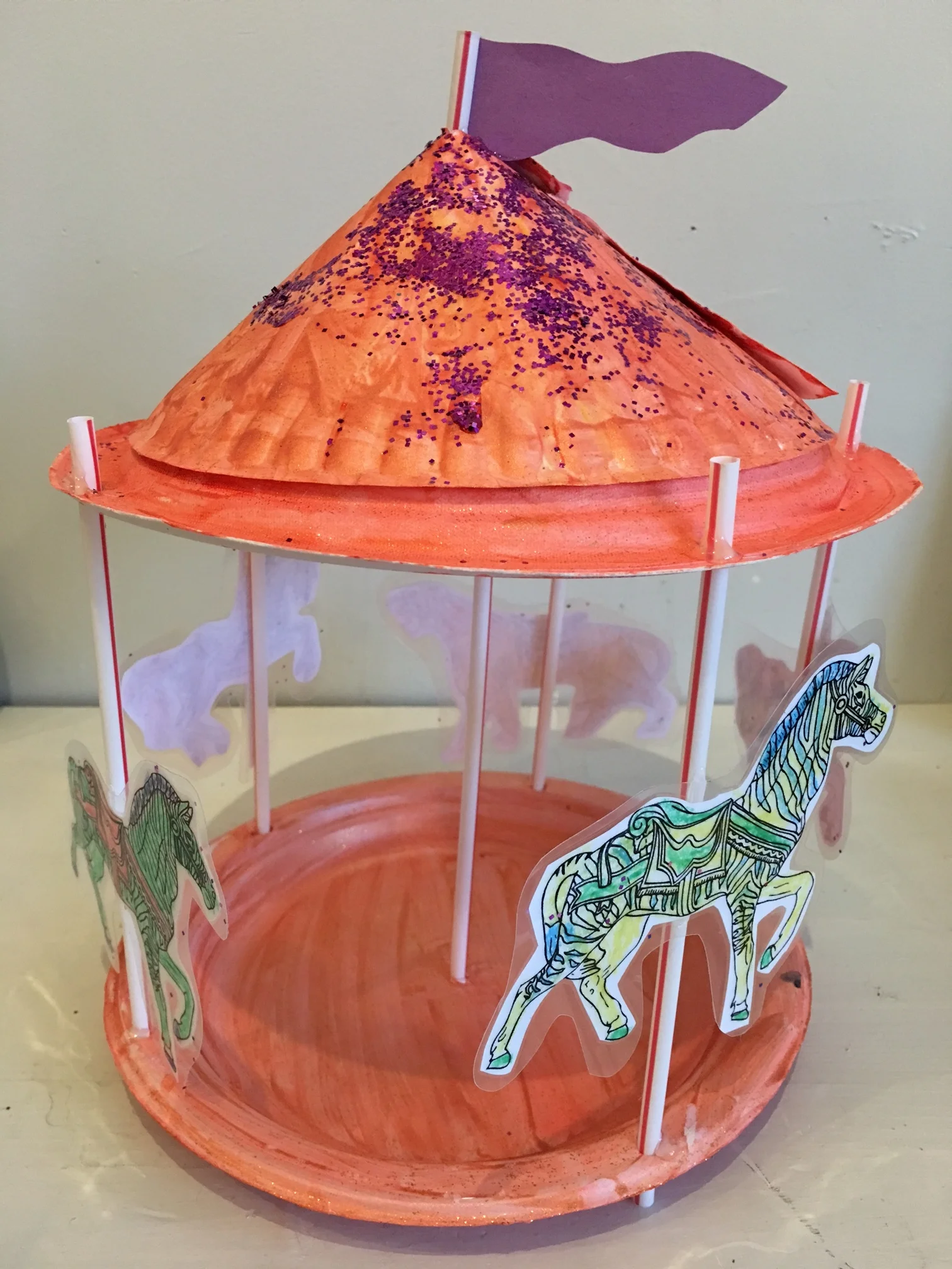 Mixed media assembled carousel with paper cut outs!