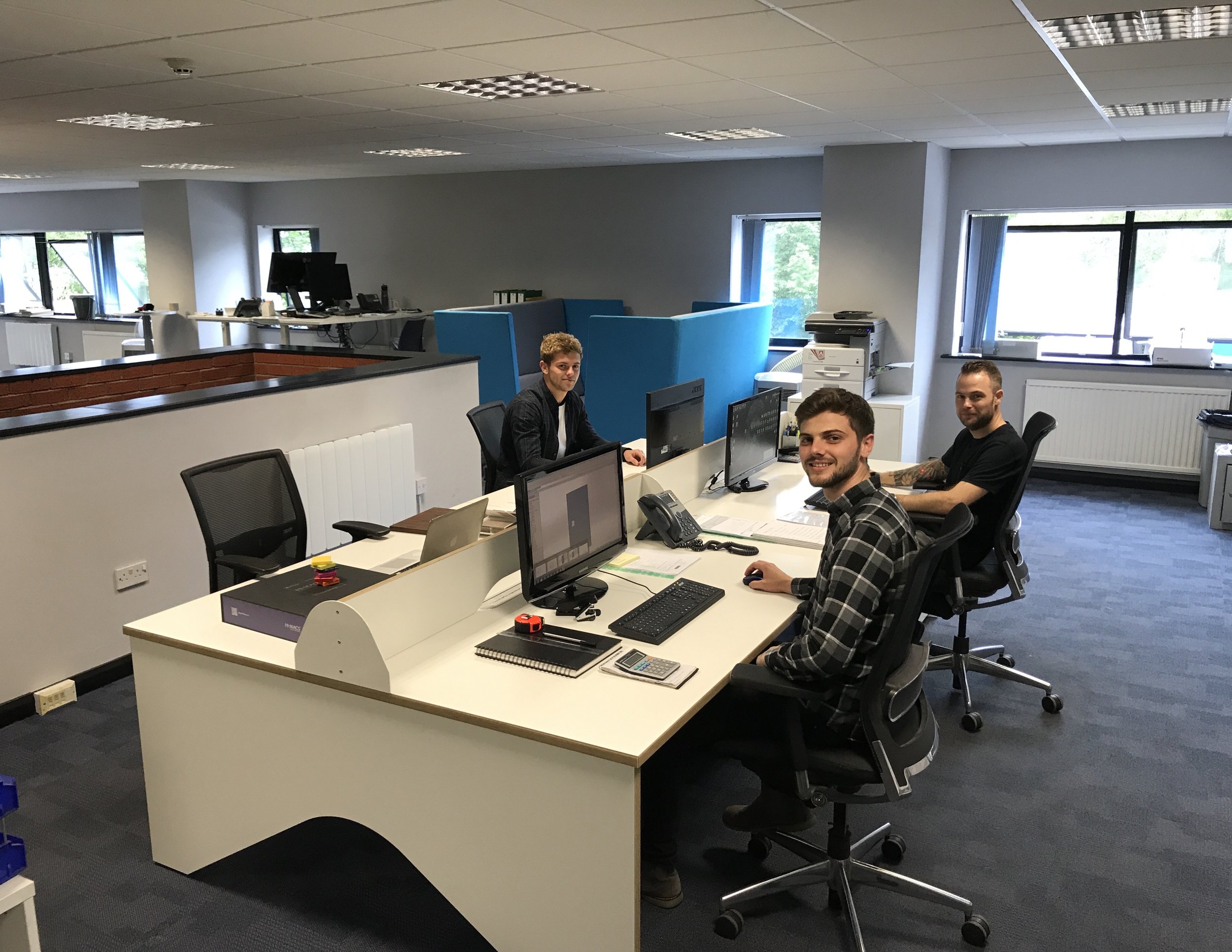 The move gave the opportunity for a new Bench desk design to be piloted. Shown here, the panel based Bench system was designed by MD Richard Blunden, and Junior Designer Matt Tilley. Manufactured entirely in-house, the Bench desking incorporates an integrated screen and cable management. Ply edge detail gives an up market feel at a reasonable price point. 