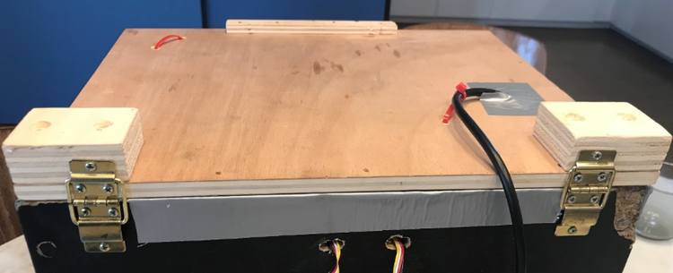 Two hinges are used in the back to enable smooth movement of the top cover.