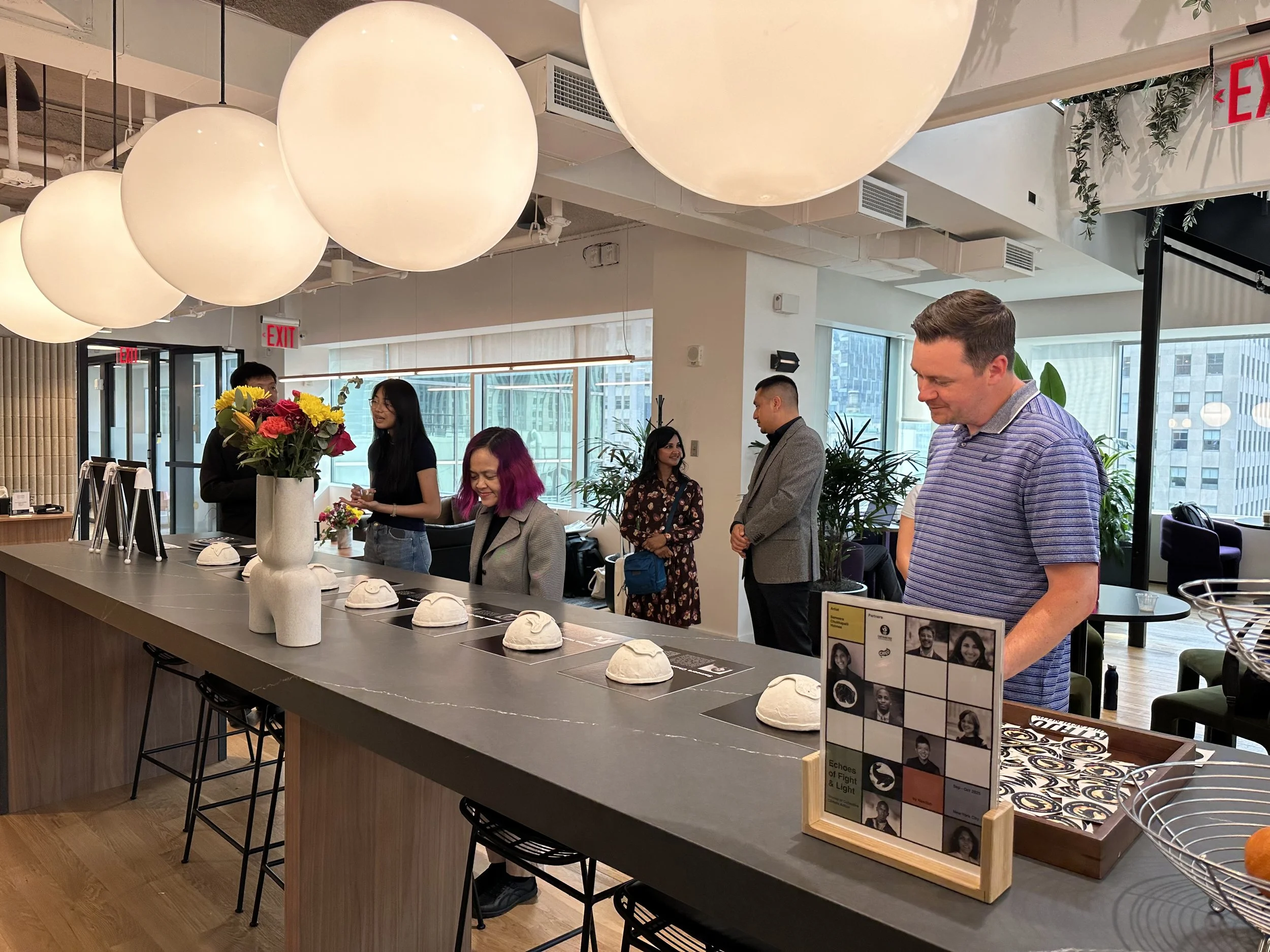 Climate leaders and professionals from Industrious engaging in conversation with youth from the First Tech Fund community.