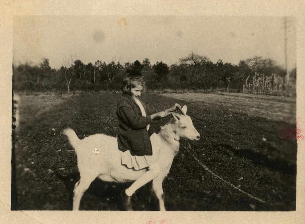 Mildred rides goat - est 1916