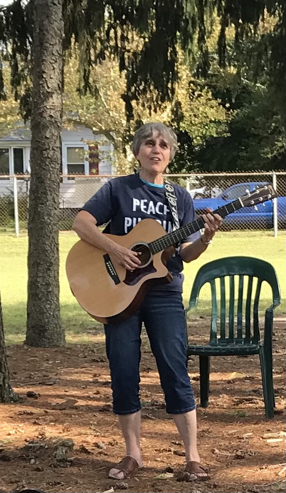  Folksinger-songwriter Pat Lamanna (who can be heard on our  Bios &amp; Music page ) added her beautiful voice to the day.  