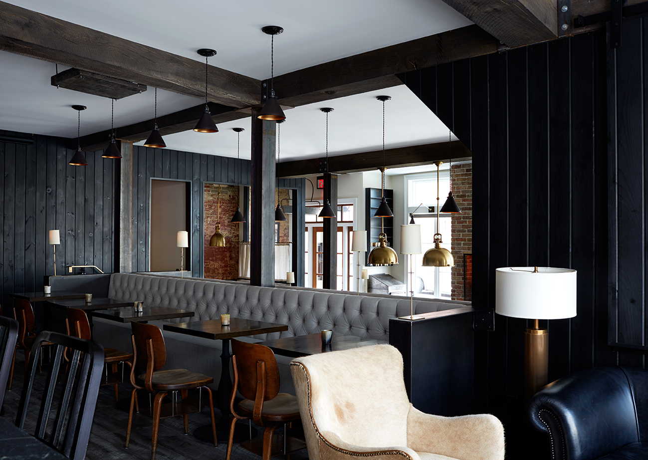 Guests often arrive at our barroom first. There's a cozy sitting area where you can see down the bar and into The Restaurant.