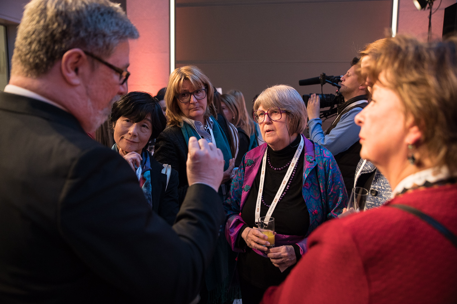 Virginia Littlejohn (fourth from left) talking with Germany's Sherpa, Mr. Röller