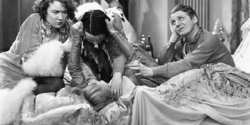 Publicity still of Louise choking out Joan Blondell in God's Gift to Women