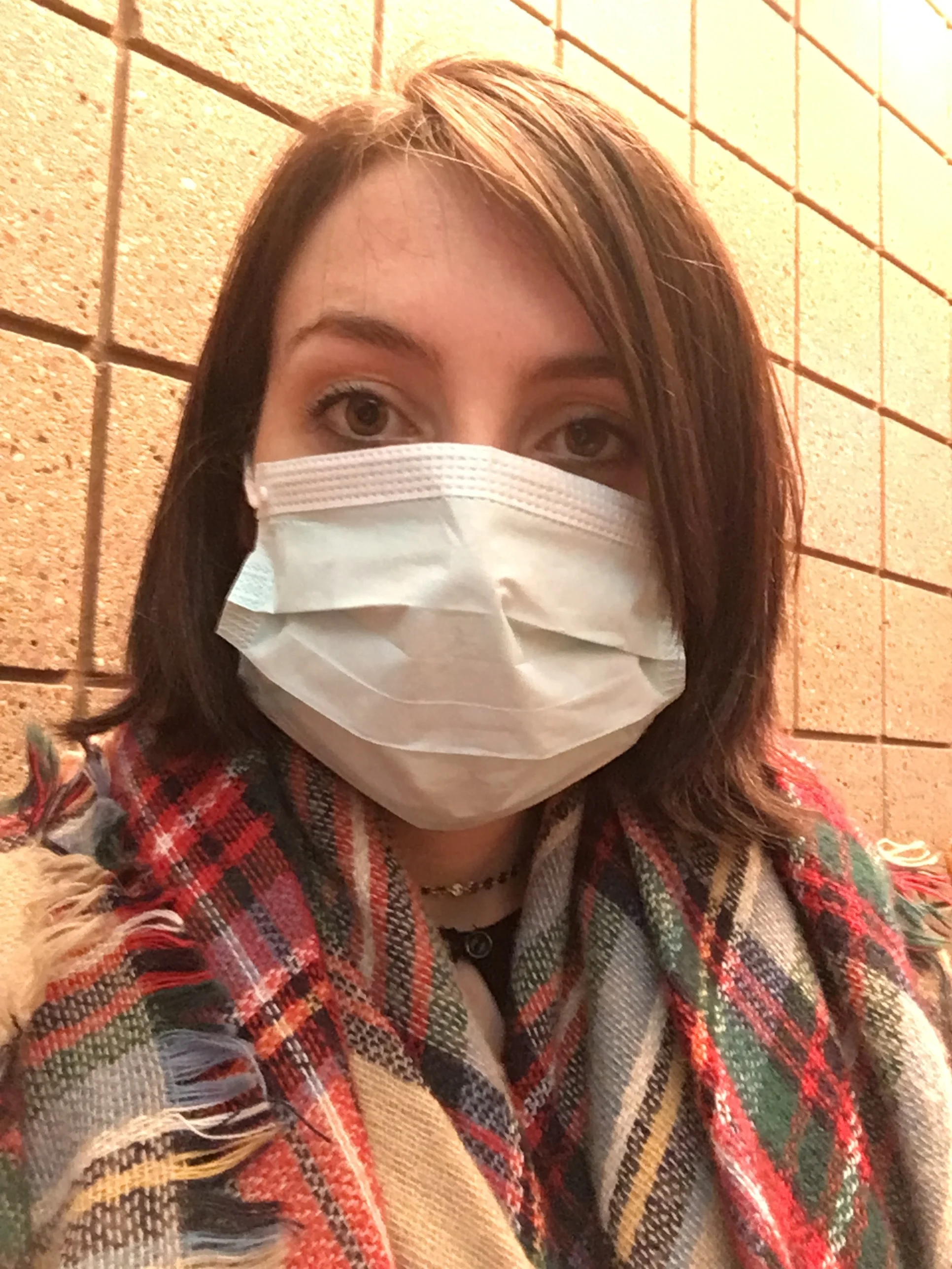 They made me wear one of these things in case I had the flu- and you guys thought I couldn't get any cuter-