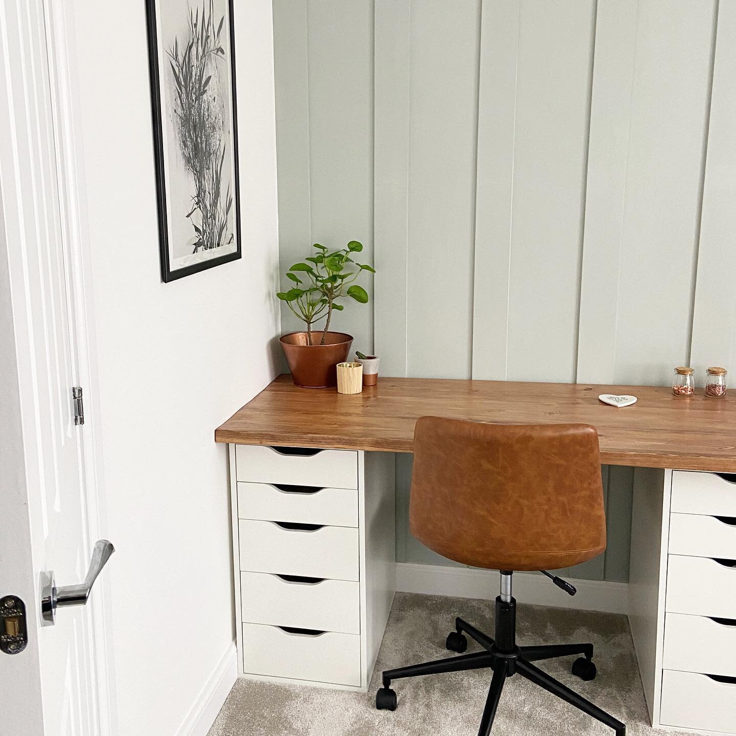 The office is still one of my favourite transformations in the house! 😍

I started by panelling the wall with MDF strips and then painted the wall with a mix of colours. I used three IKEA drawer units for the base of the desk and then secured the de