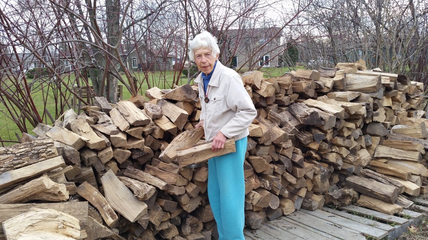 One of the First Residents of Stelle - Carroll, Stacking her Firewood