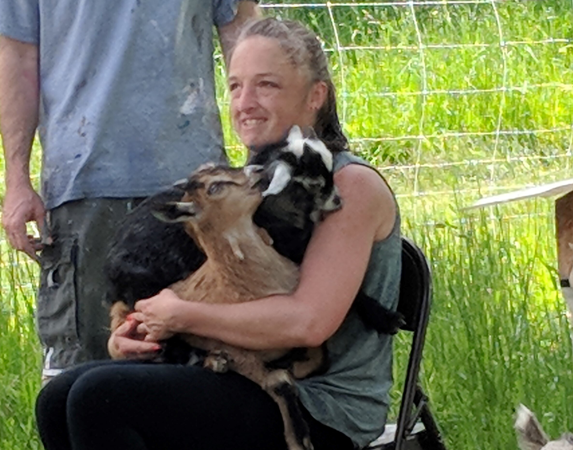 Heather Enjoying Goat Time - The Goats Help Keep Weeds Down on the CSC Land