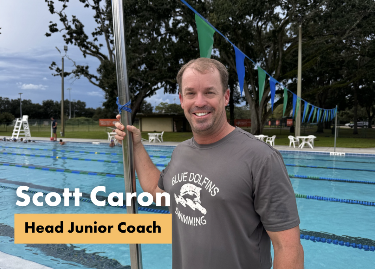 Image shows Coach Scott Caron standing poolside