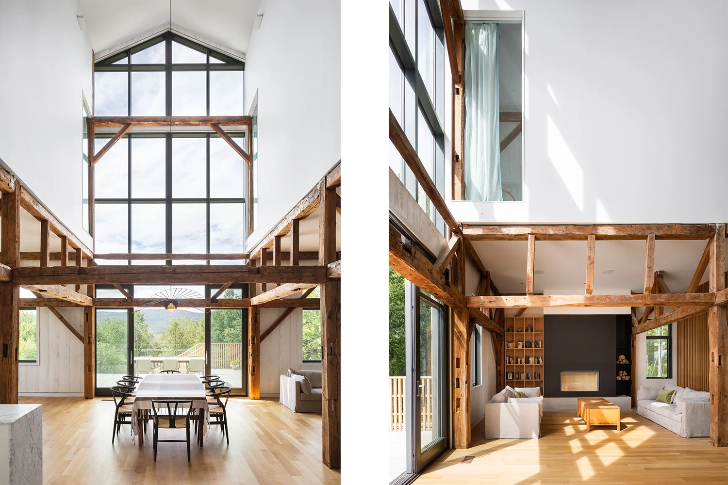 Dining room of a chalet with cathedral ceiling and large windows. Old wooden structure apparent. Black steel fireplace mantel on concrete base. White oak floor