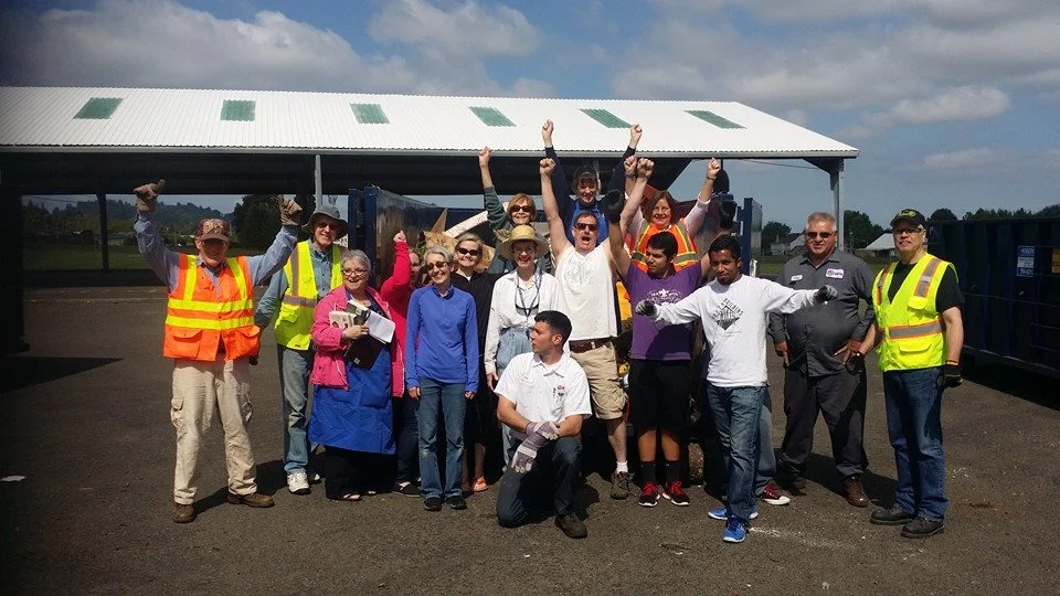 Volunteers having fun at the 2014 Clean Up.