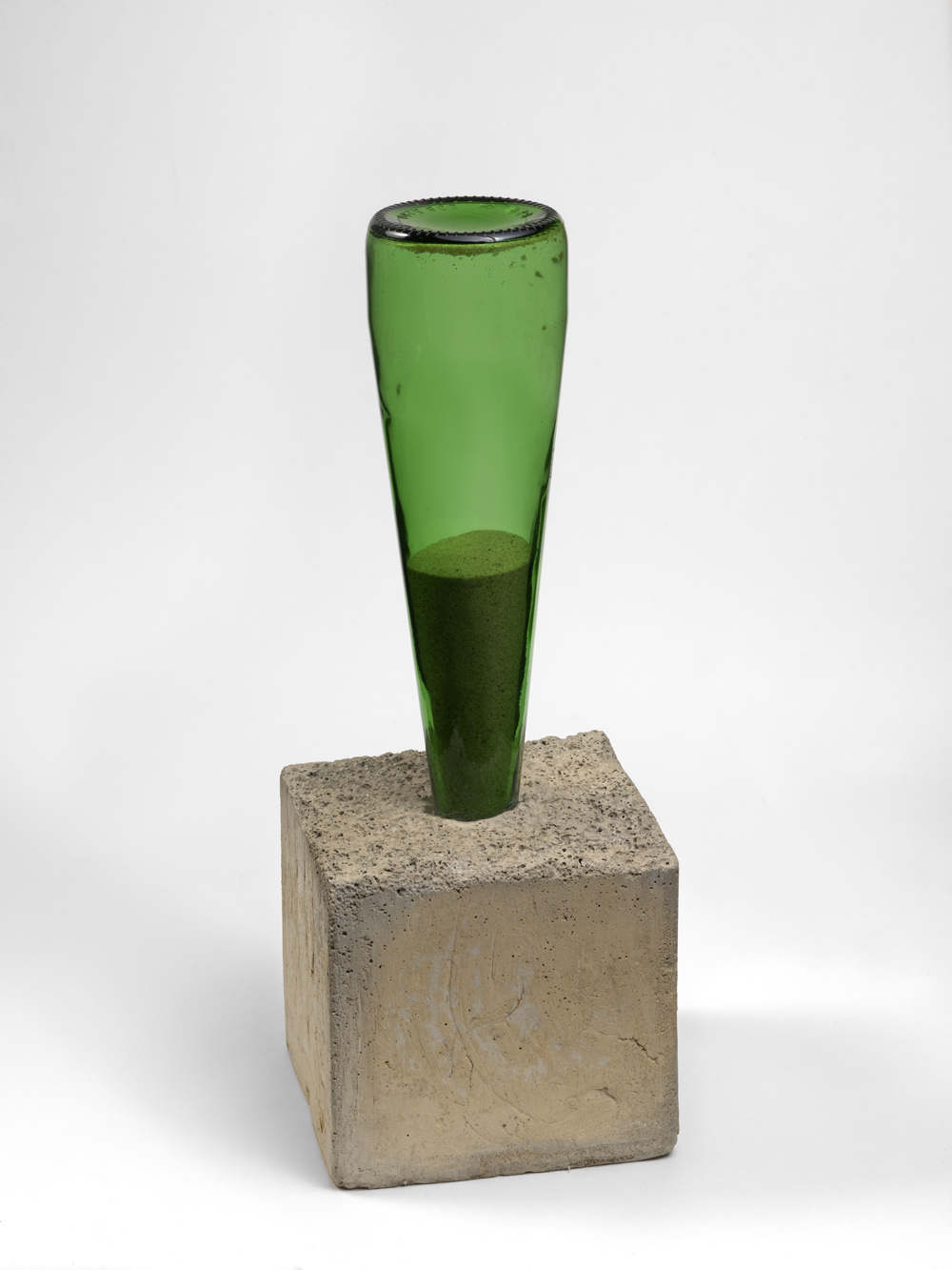  Alexandre da Cunha,&nbsp; 1736070909 ,&nbsp;2009,&nbsp;Concrete, sand and bottle,&nbsp;37 x 13 cm,&nbsp;Courtesy the artist and Thomas Dane Gallery, London 