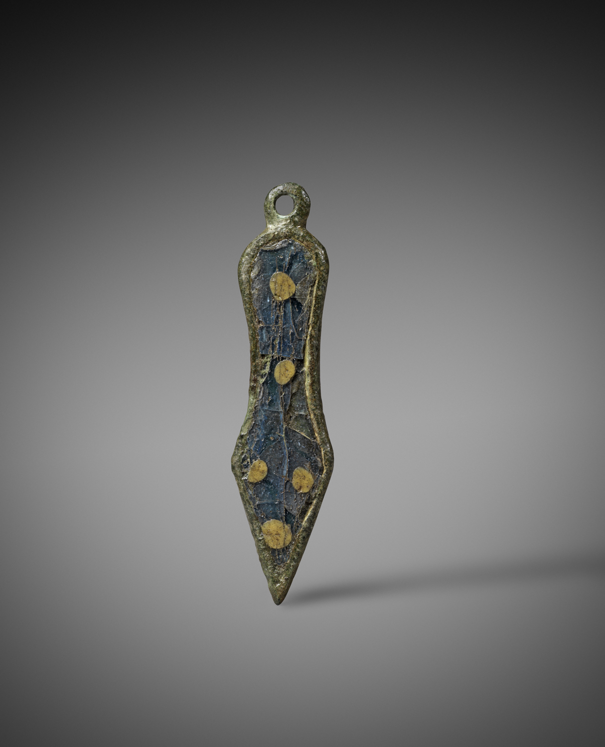   Romano-British Brooch in the Form of a Sandal-sole ,&nbsp;Circa 2nd century C.E.,&nbsp;Bronze with enamel inlays,&nbsp;Length 4 cm,&nbsp;Courtesy Rupert Wace Ancient Art, London 
