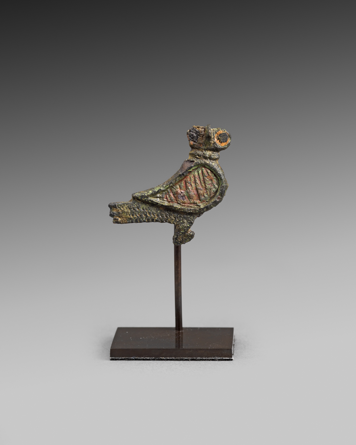   Gallo-Roman Owl Plate Brooch ,&nbsp;2nd - 3rd century C.E.,&nbsp;Bronze with enamel inlays,&nbsp;2.6 x 2.8 cm,&nbsp;Courtesy Rupert Wace Ancient Art, London 