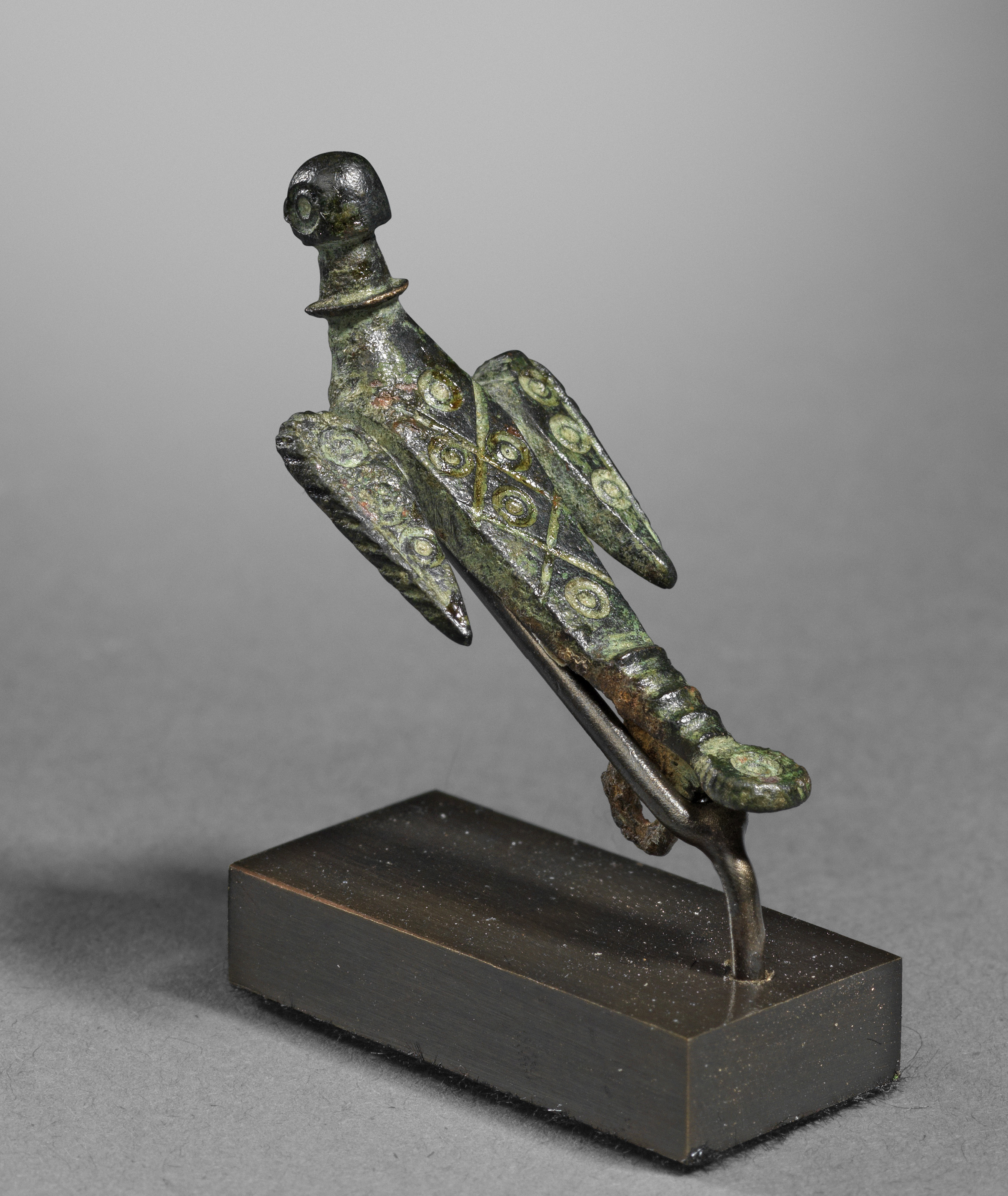   Gallo-Roman Fibula in the Form of a Flying Bird ,&nbsp;2nd - 3rd century C.E.,&nbsp;Bronze,&nbsp;Length 4 cm,&nbsp;Courtesy Rupert Wace Ancient Art, London 