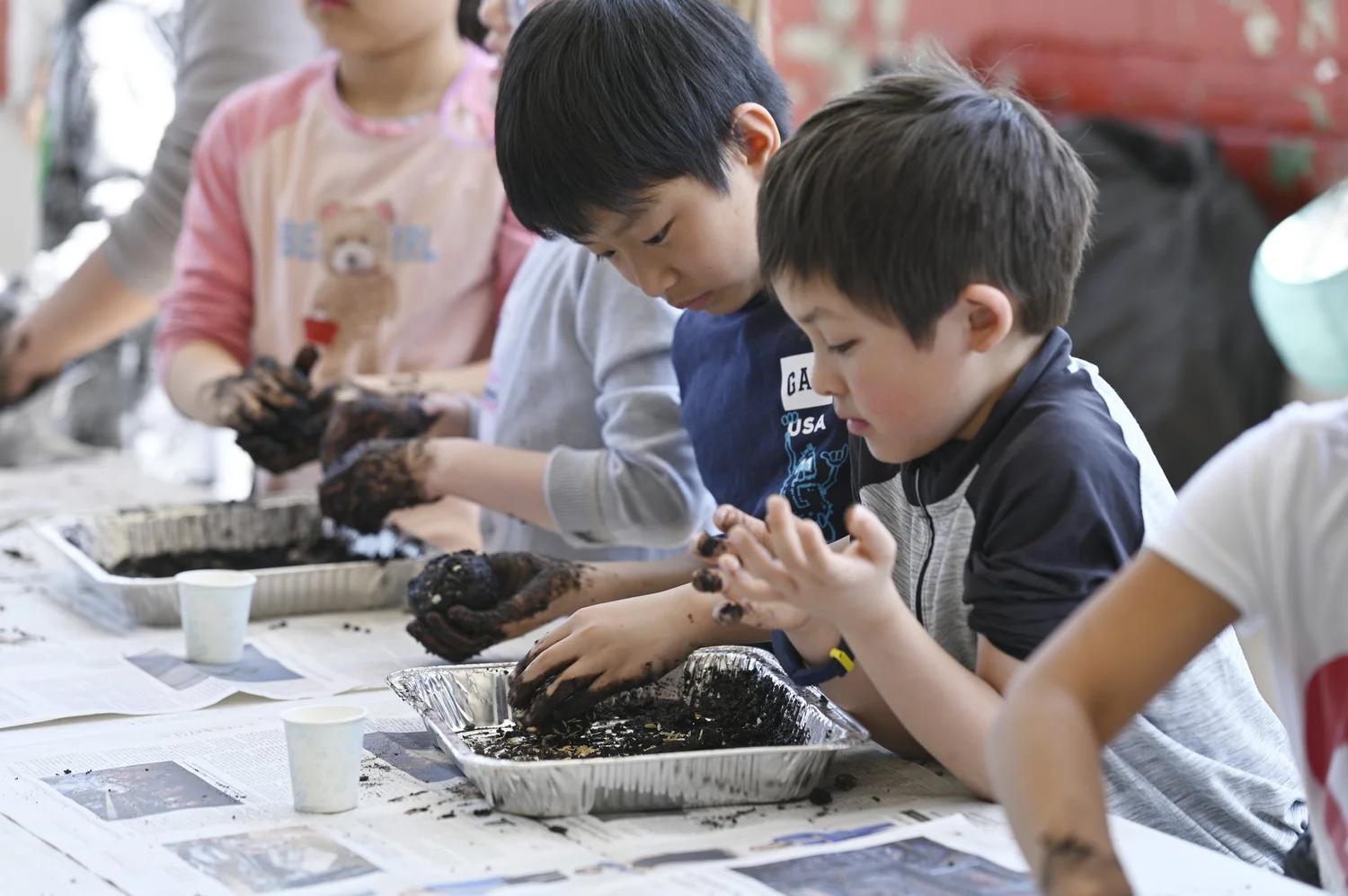 Neurodiverse students participating in a calm, hands-on experiential learning activity