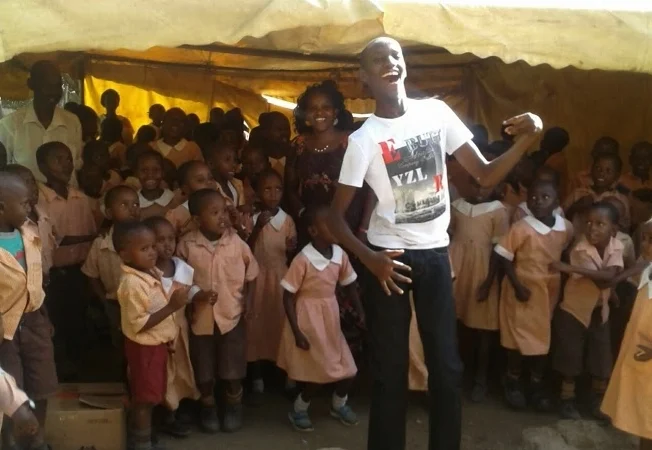 George inspiring a group of school kids