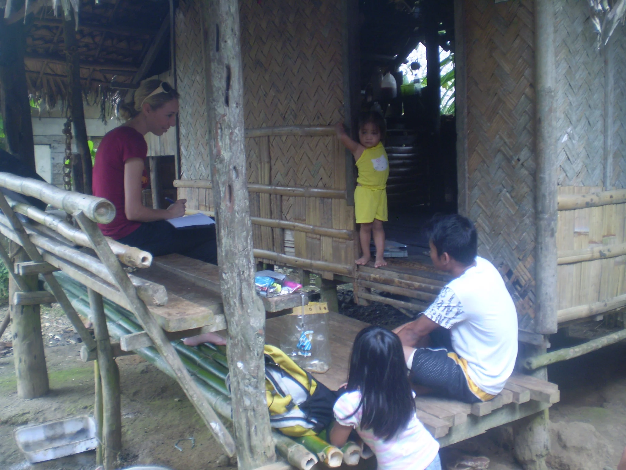 Christey interviewing survivor of labour trafficking, Northern Samar, Philippines