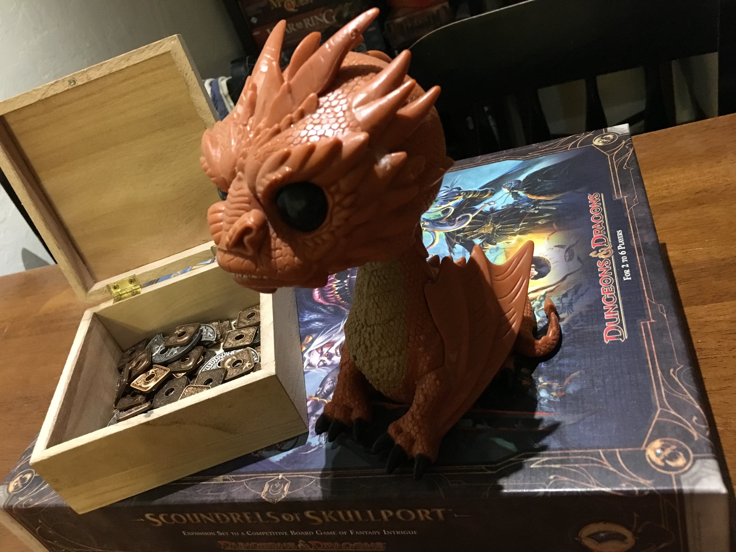 The coveted Golden Smaug award, with his box of Waterdeep treasures.