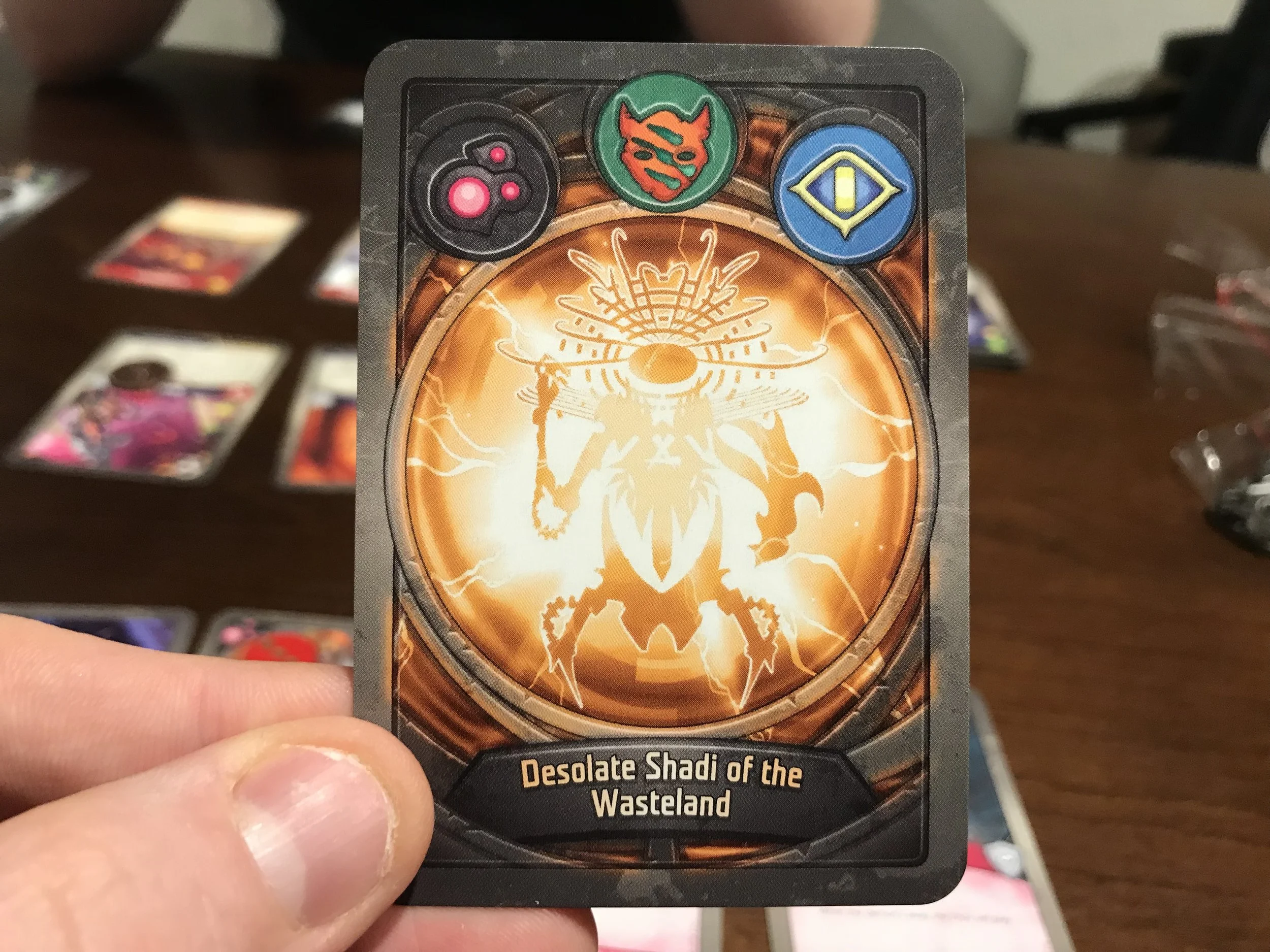 Every Keyforge deck has a unique back with the procedurally generated deck name. For what it’s worth, Shadi’s a 10.