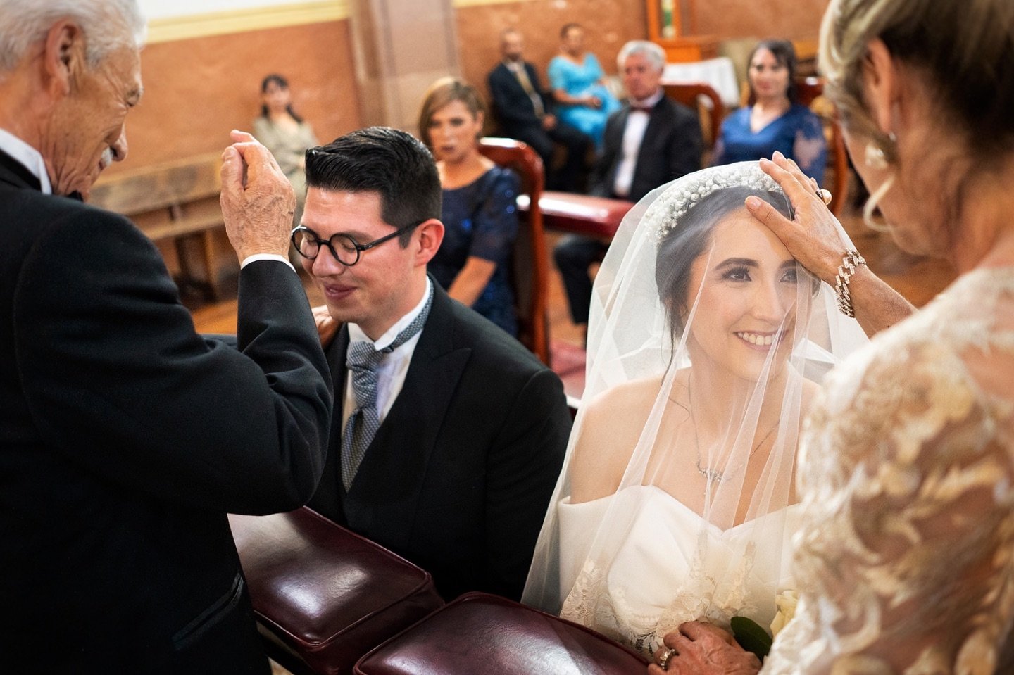 Caro y Alfredo blessed by her parents when getting married at El Sagrario in #patzcuaromichoacan 
&bull;
@weddingsbychio