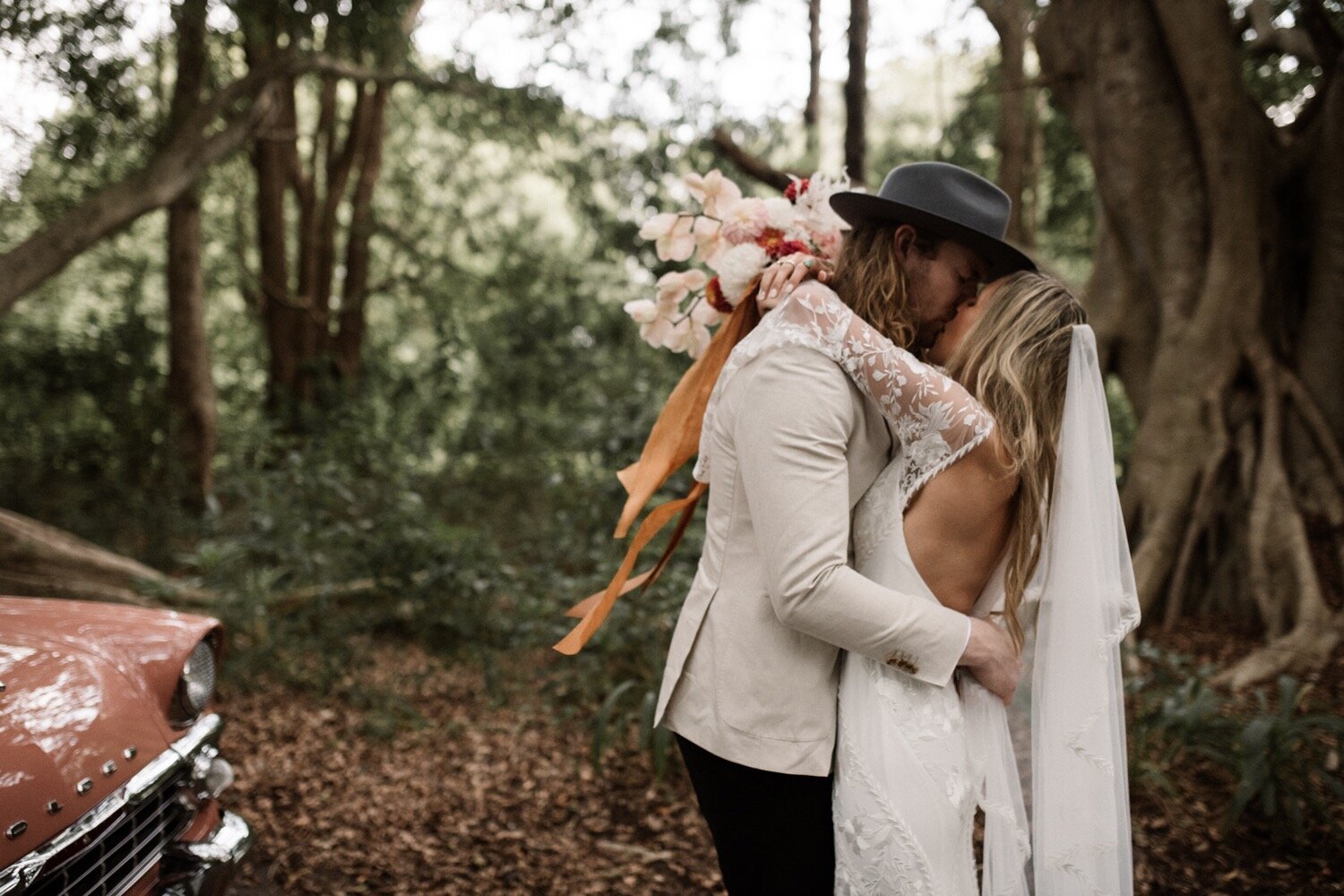 wedding-elopement-byron-bay-rain-photography-wild-adventure-boho-bride-bohemian-at-heart-dress-photographer-flowers-bouquet (5).jpg