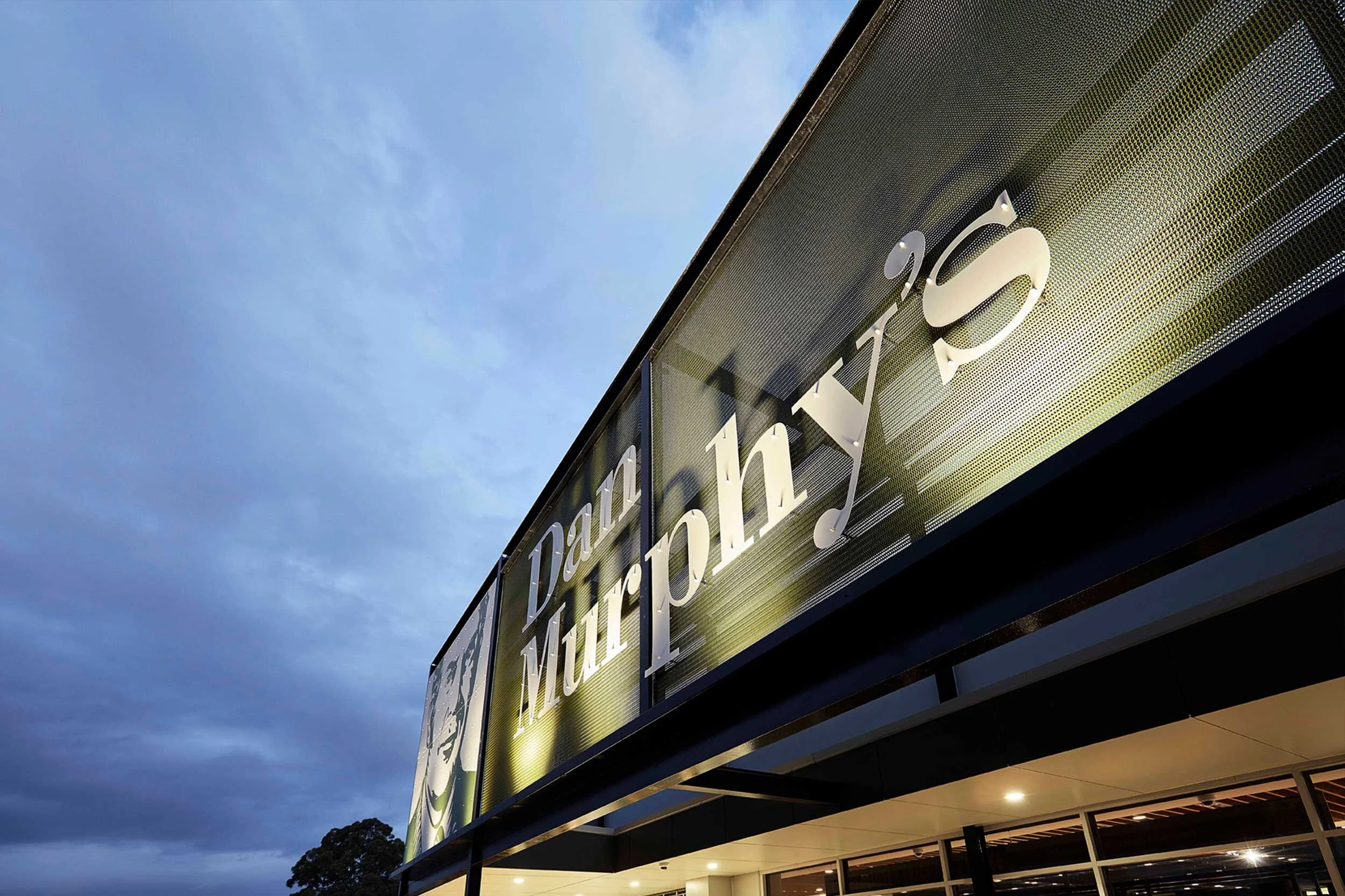 Custom coloured mesh exterior screening for Dan Murphy's — Kaynemaile ...