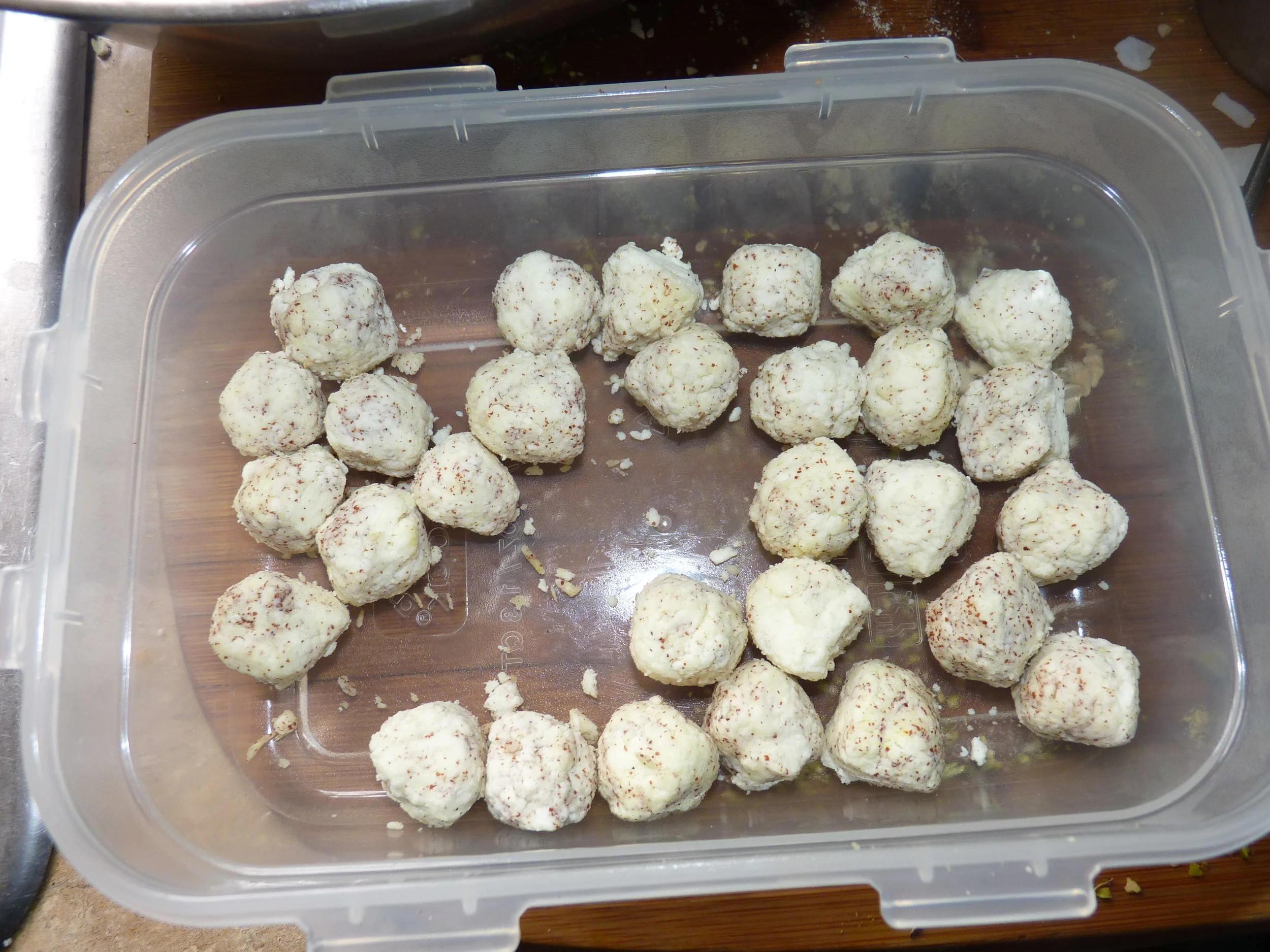 Roll the chenna cheese into balls with ragi (or rice flour) as a binder