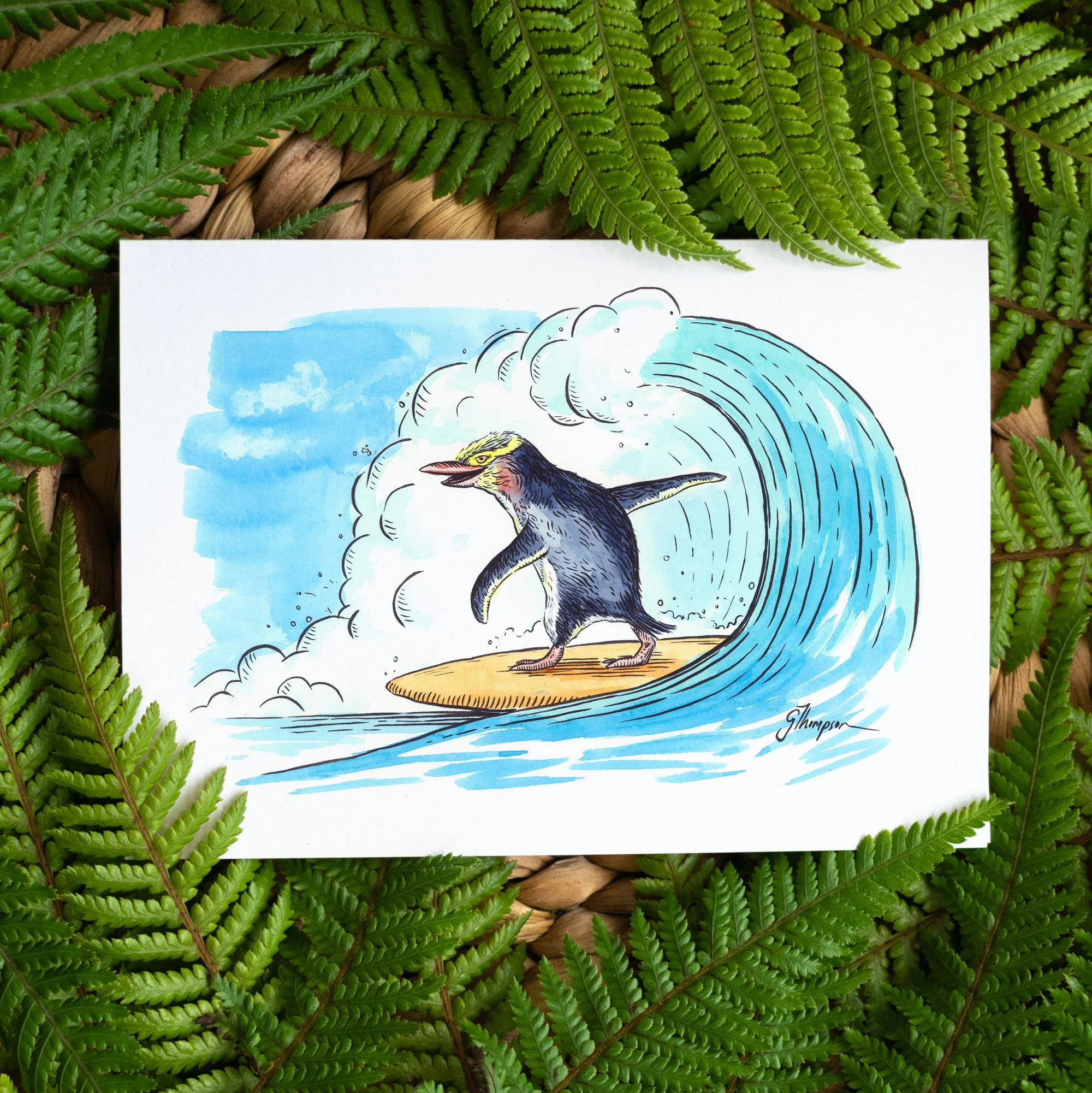 shop-greeting-card-surfs-up-hoiho-fern-BG-angle-01.jpg