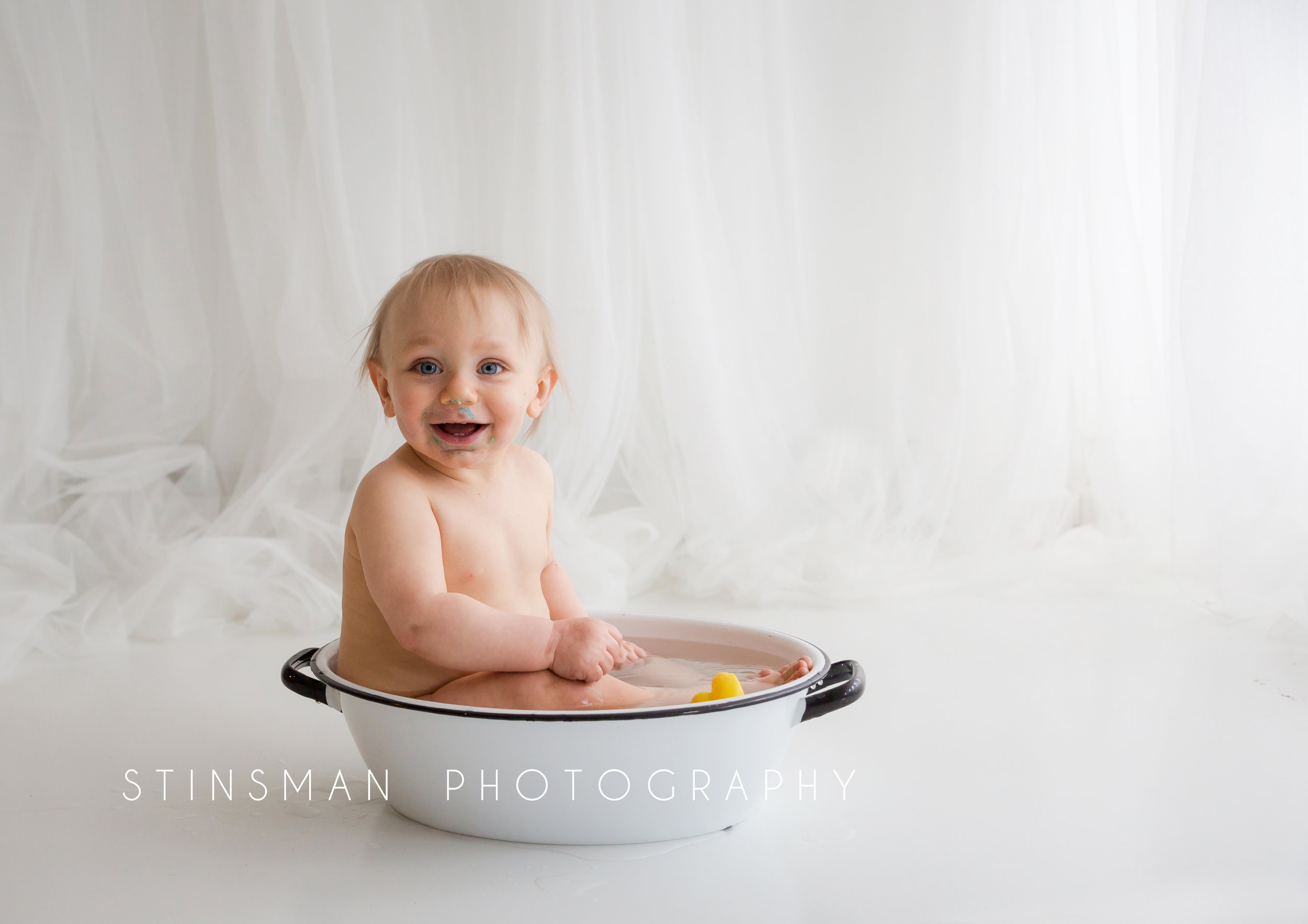smiling baby in the tub