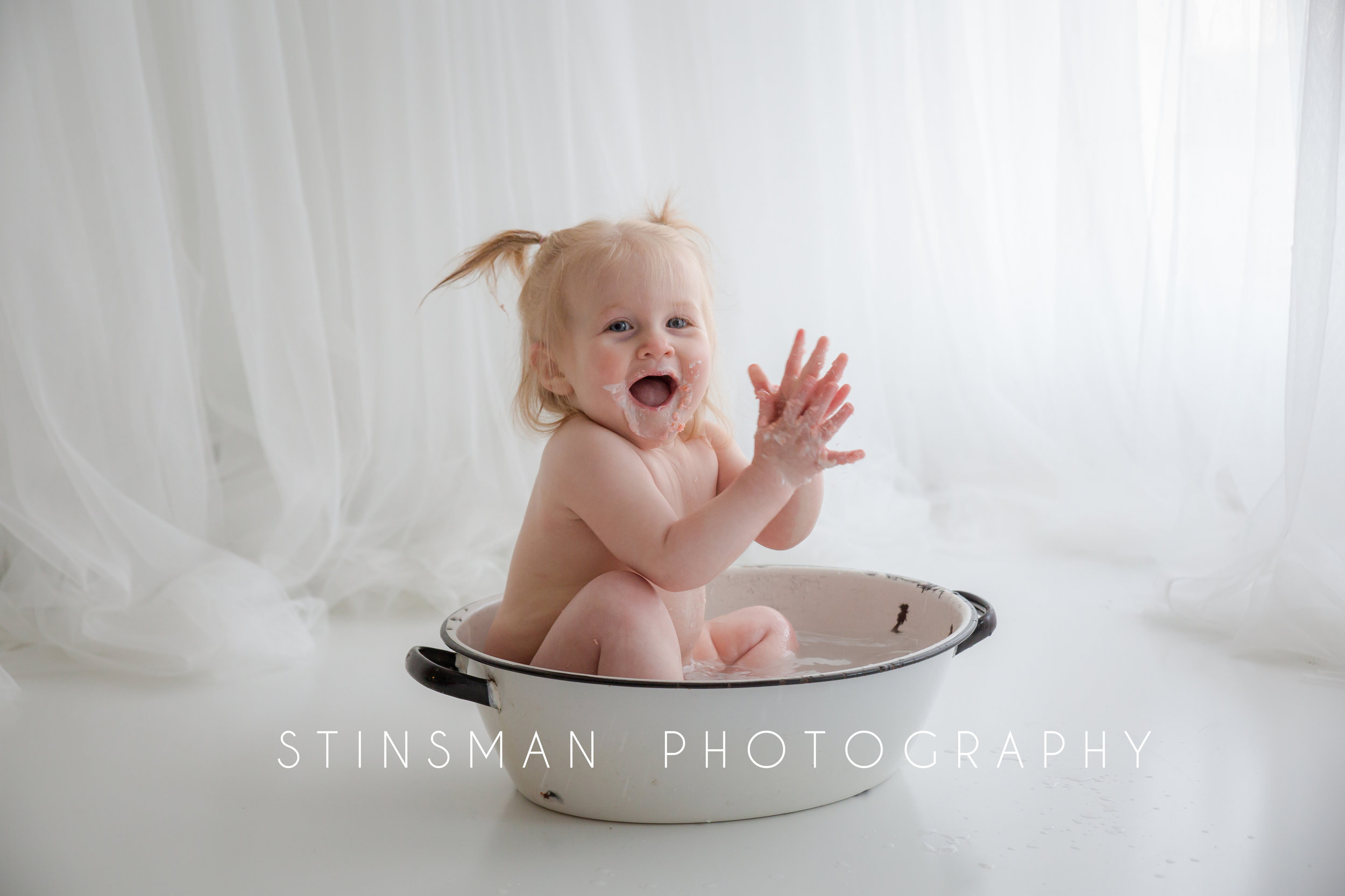 happy baby in the bath tub