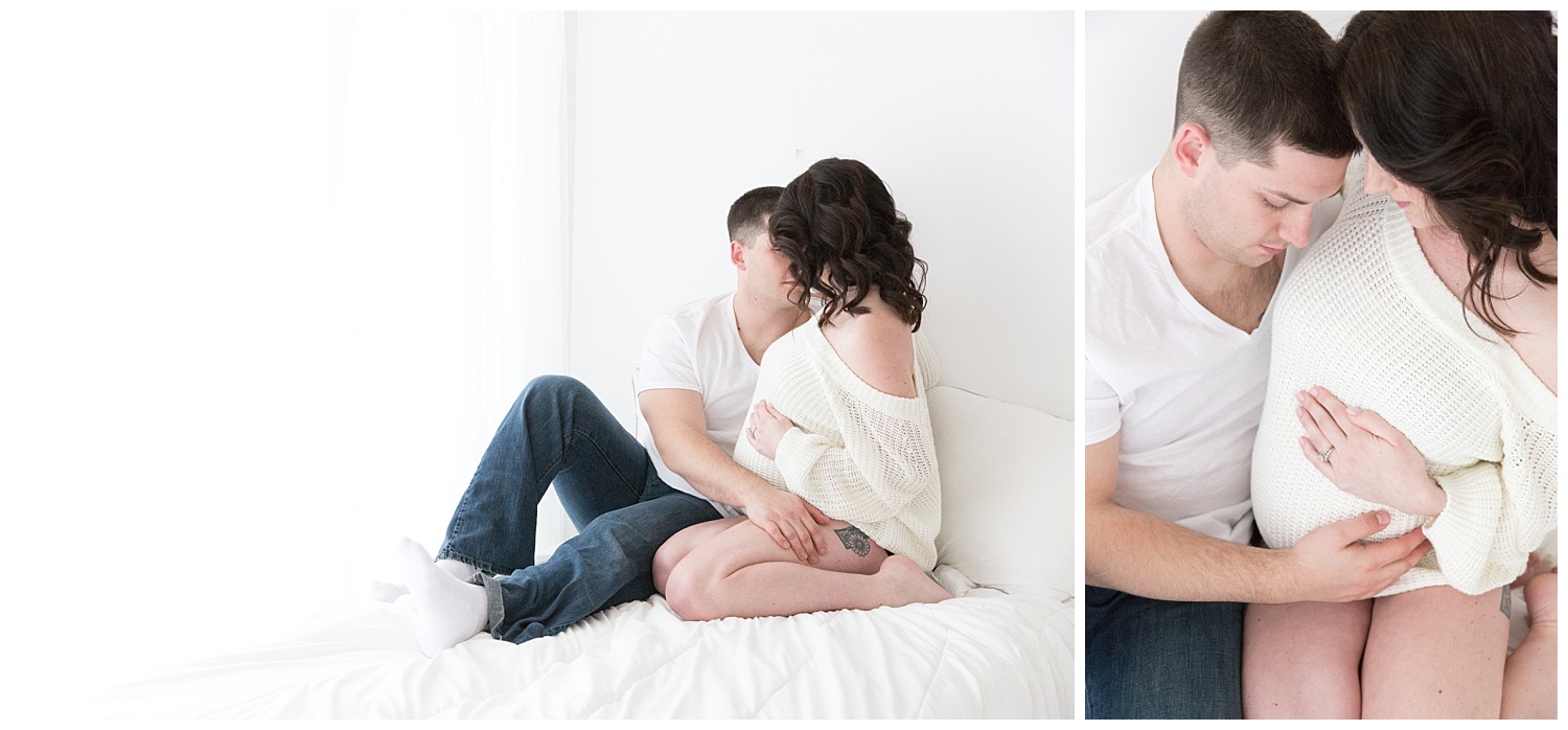 mom and dad snuggling for pregnancy photos